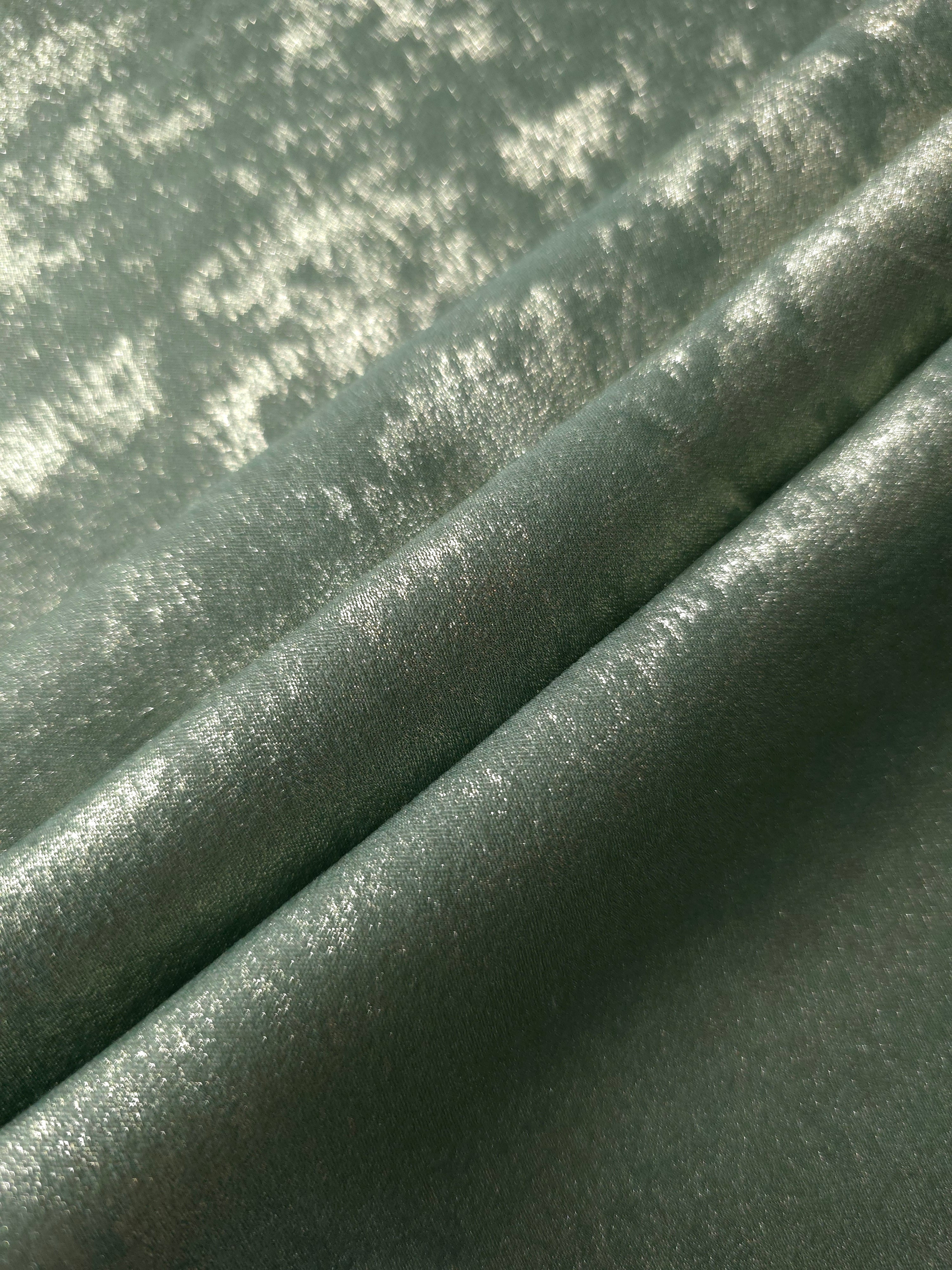 Misty Sage Lurex Italiano metallic fabric in a rosette drape showing soft shimmer