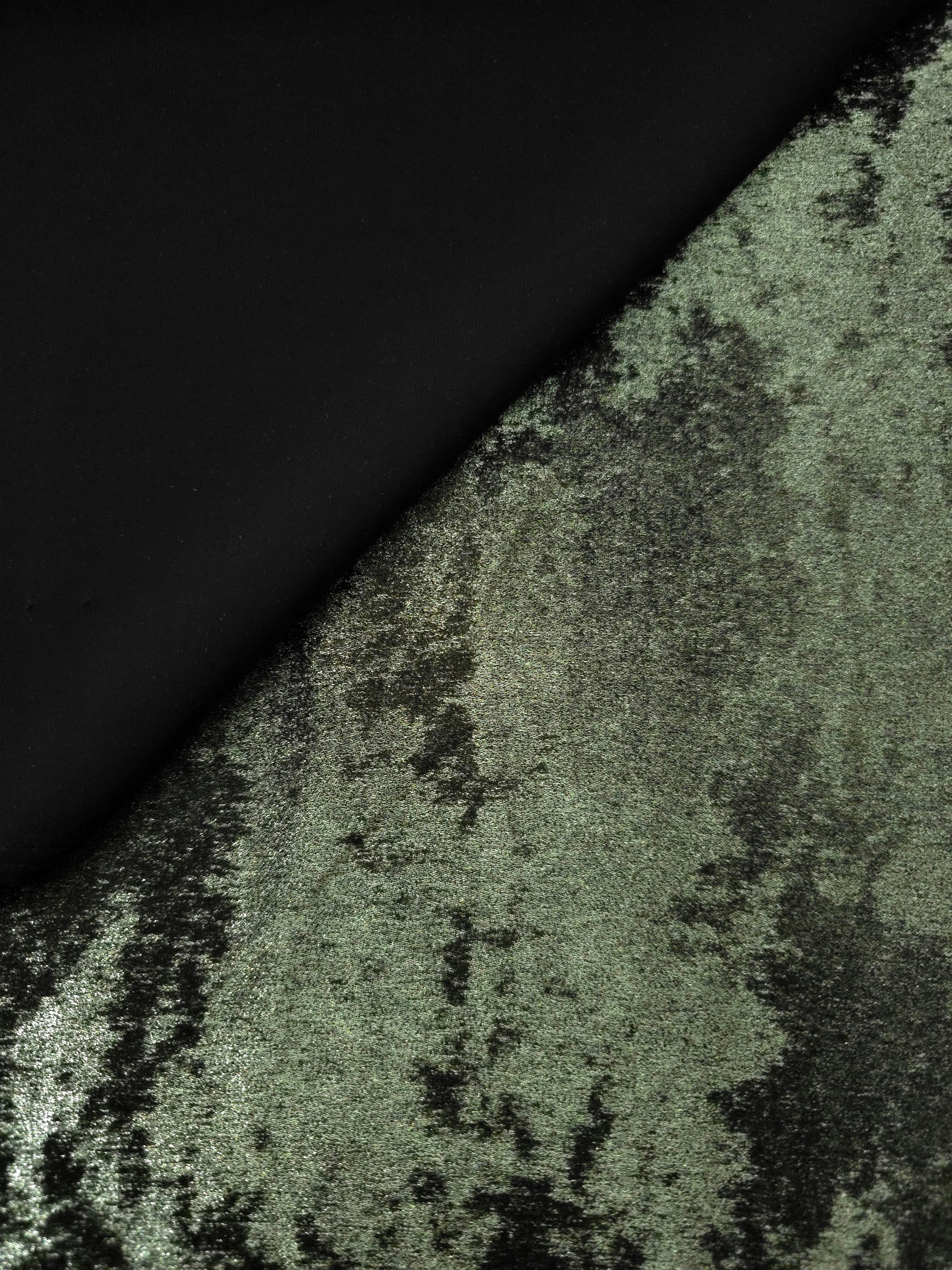 Reverse side of Moss Green Lurex Italiano metallic fabric for garment construction
