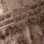 Mushroom Taupe Lurex Italiano fabric in diagonal folds showing metallic sheen and drape for eveningwear.
