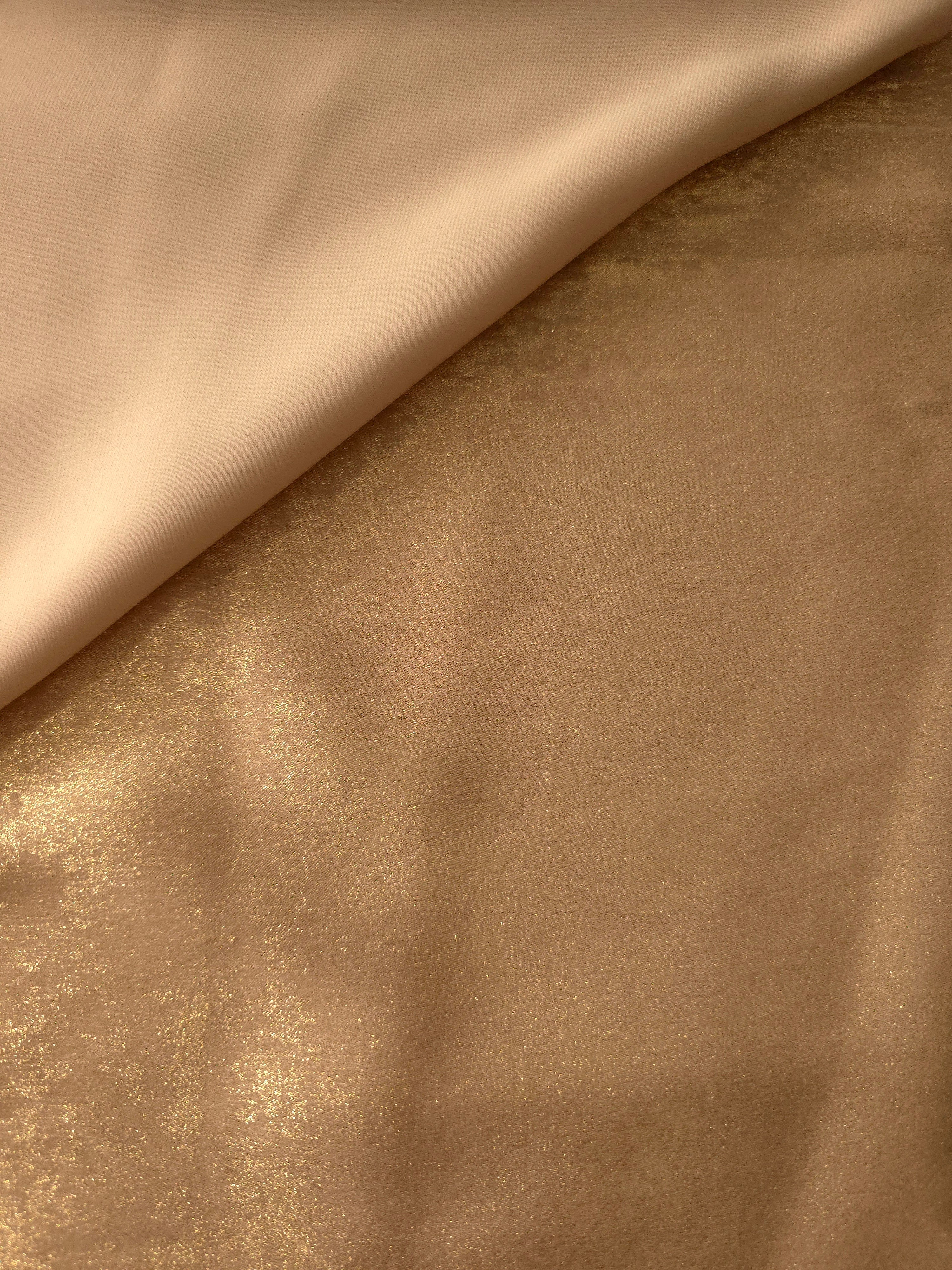 Flat view of Nude Gold Lurex Italiano fabric showing its metallic foil surface for luxury apparel.