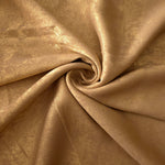 Reverse side of Nude Gold Lurex Italiano fabric showing the backing and metallic finish for garment production.