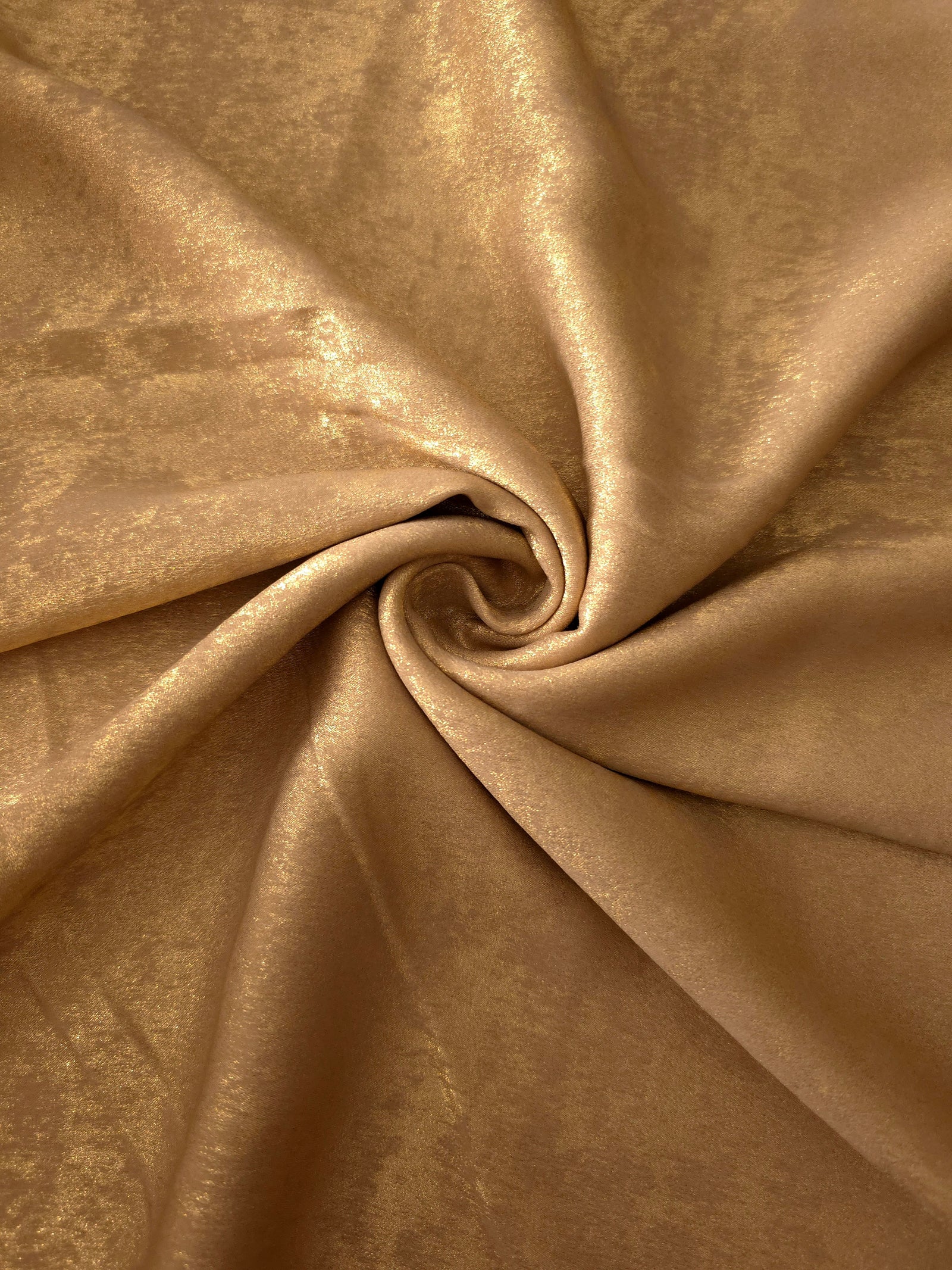 Reverse side of Nude Gold Lurex Italiano fabric showing the backing and metallic finish for garment production.