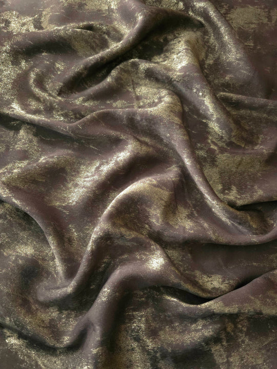 Flowing folds of Olive Bronze Lurex Italiano fabric highlighting fluid drape for abayas, kaftans and modest dresses.