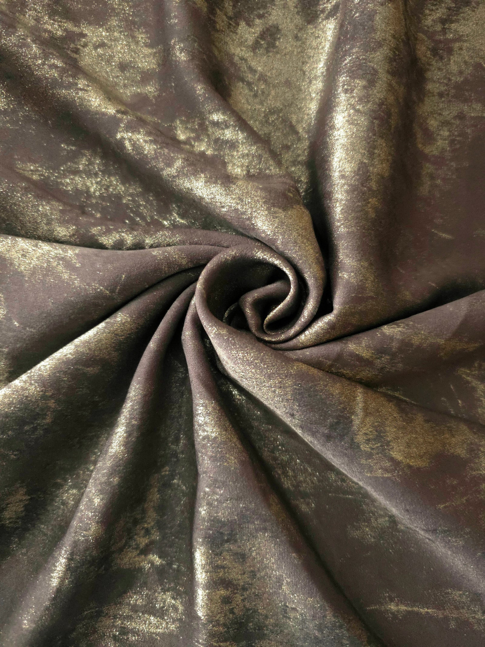 Rosette drape of Olive Bronze Lurex Italiano fabric emphasizing metallic shimmer for kaftans and occasionwear.