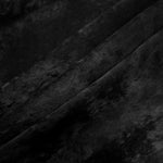 Onyx Black Lurex Italiano fabric in diagonal folds showing metallic sheen and drape for eveningwear.