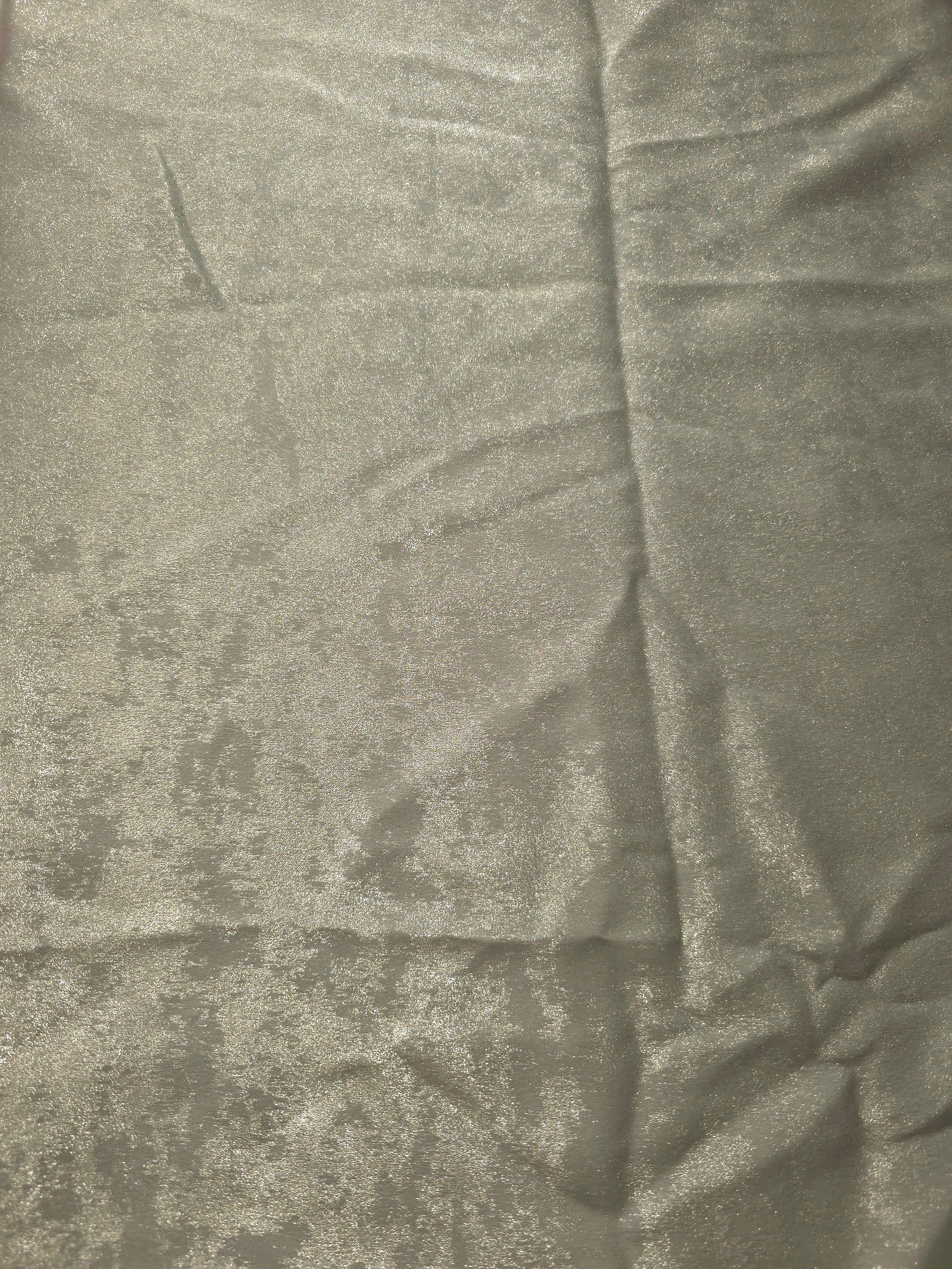 Flat view of Pearl Silver Lurex Italiano fabric showing its metallic foil surface for luxury apparel.