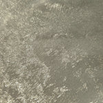 Macro close-up of Pearl Silver Lurex Italiano fabric revealing metallic texture for designer apparel.