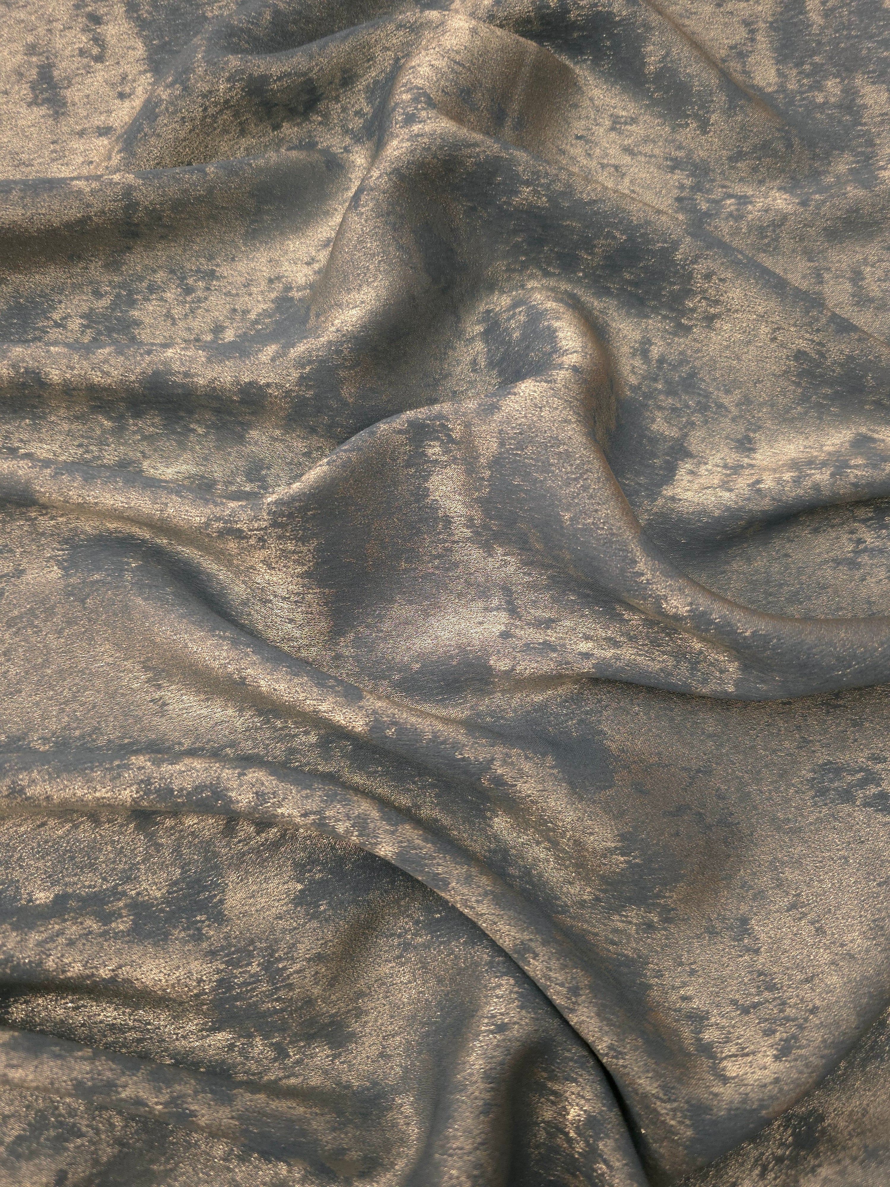Fluid drape of Pewter Bronze Lurex Italiano metallic fabric for abayas and gowns