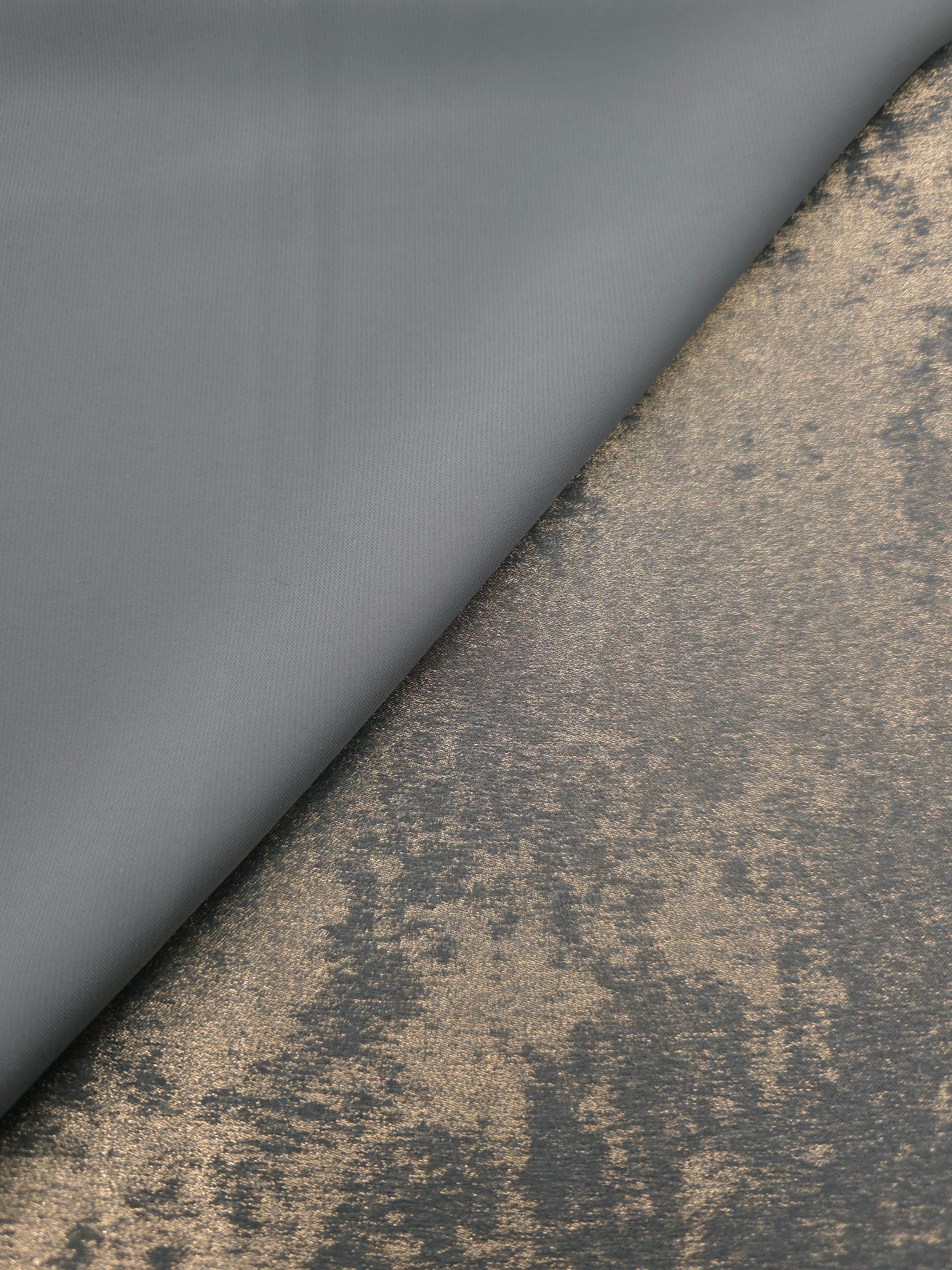 Reverse side of Pewter Bronze Lurex Italiano metallic fabric for apparel construction