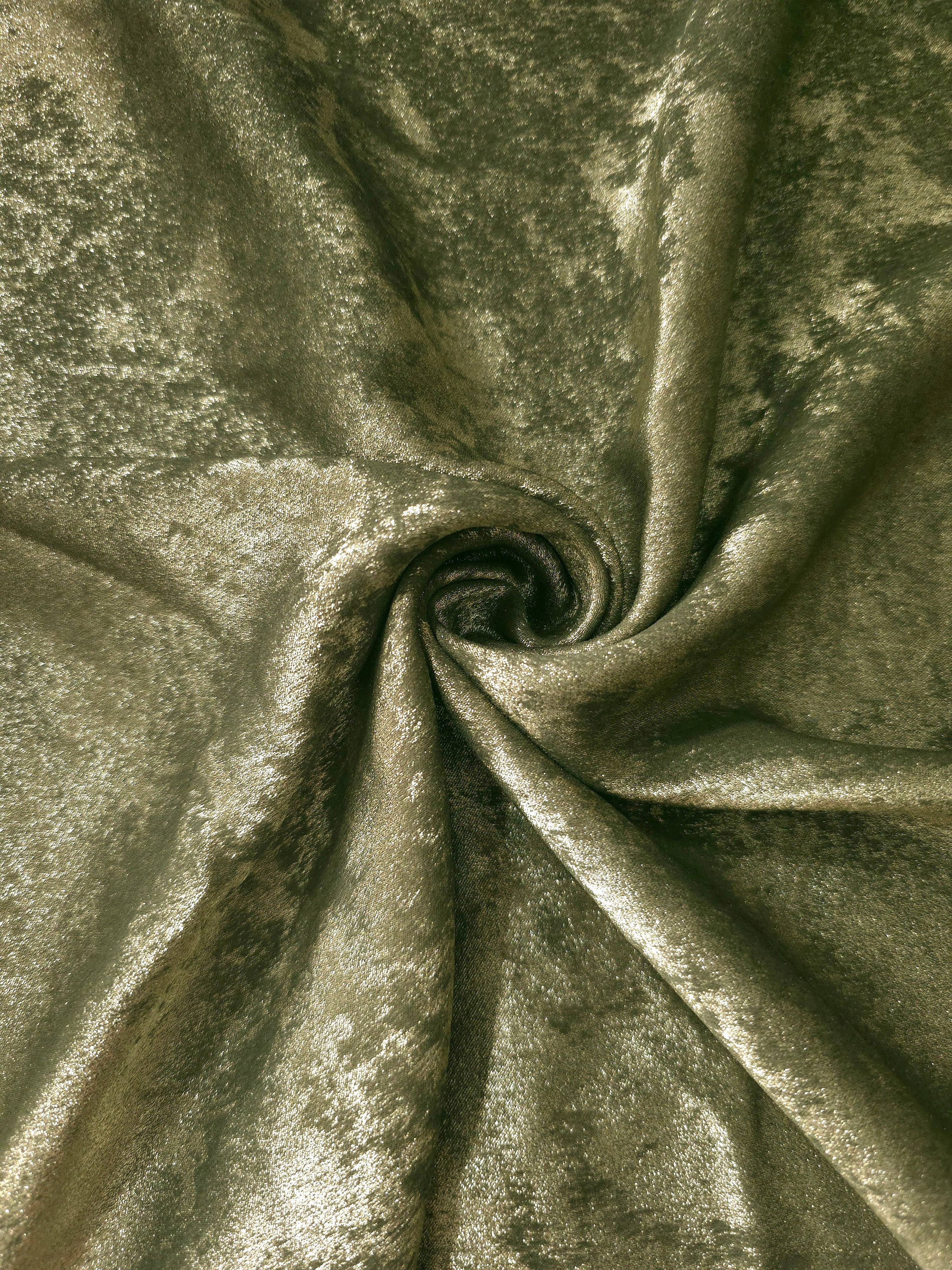 Rosette drape of Pewter Olive Lurex Italiano fabric emphasizing shimmer for kaftans and occasionwear.