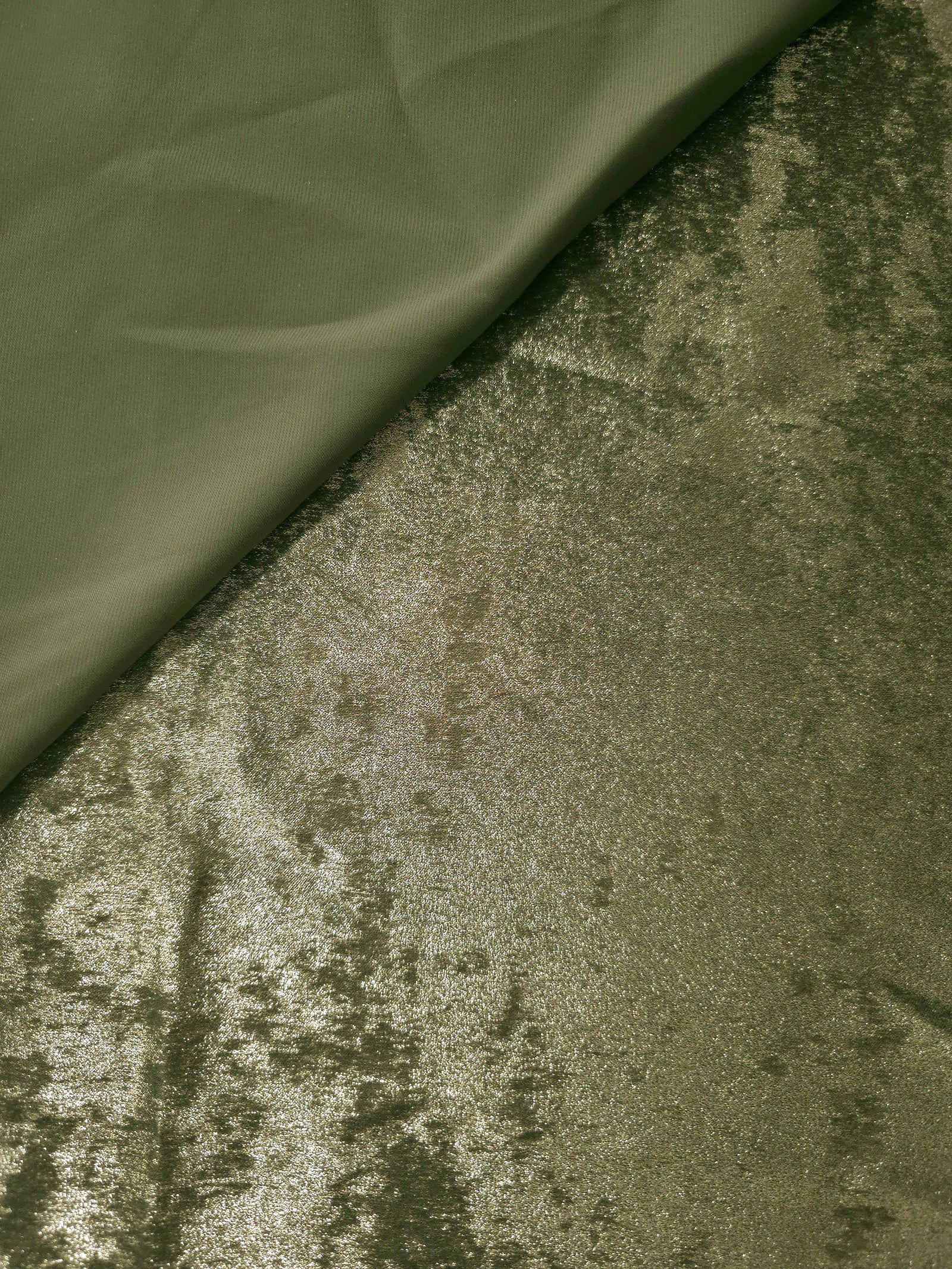 Reverse side of Pewter Olive Lurex Italiano fabric showing the backing and metallic finish for garment production.