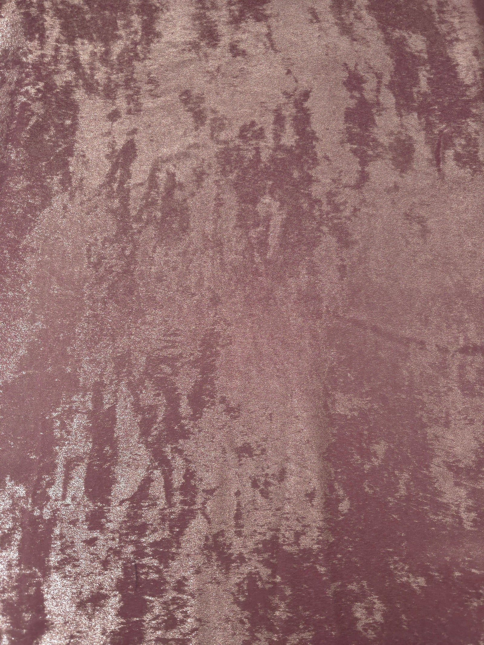 Flat view of Rose Mauve Lurex Italiano fabric showing its metallic foil surface for luxury apparel.