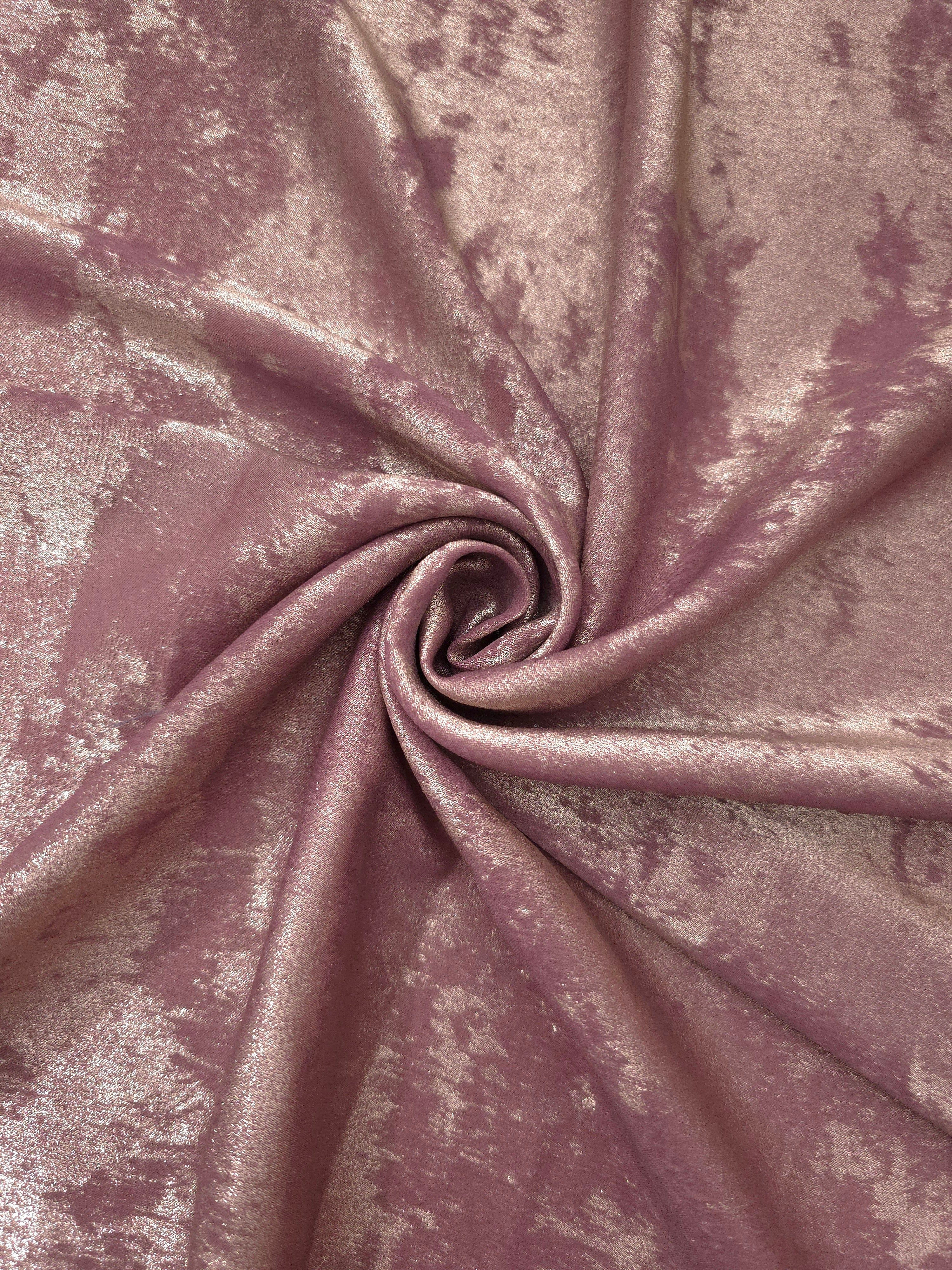 Rosette drape of Rose Mauve Lurex Italiano fabric emphasizing shimmer for kaftans and occasionwear.