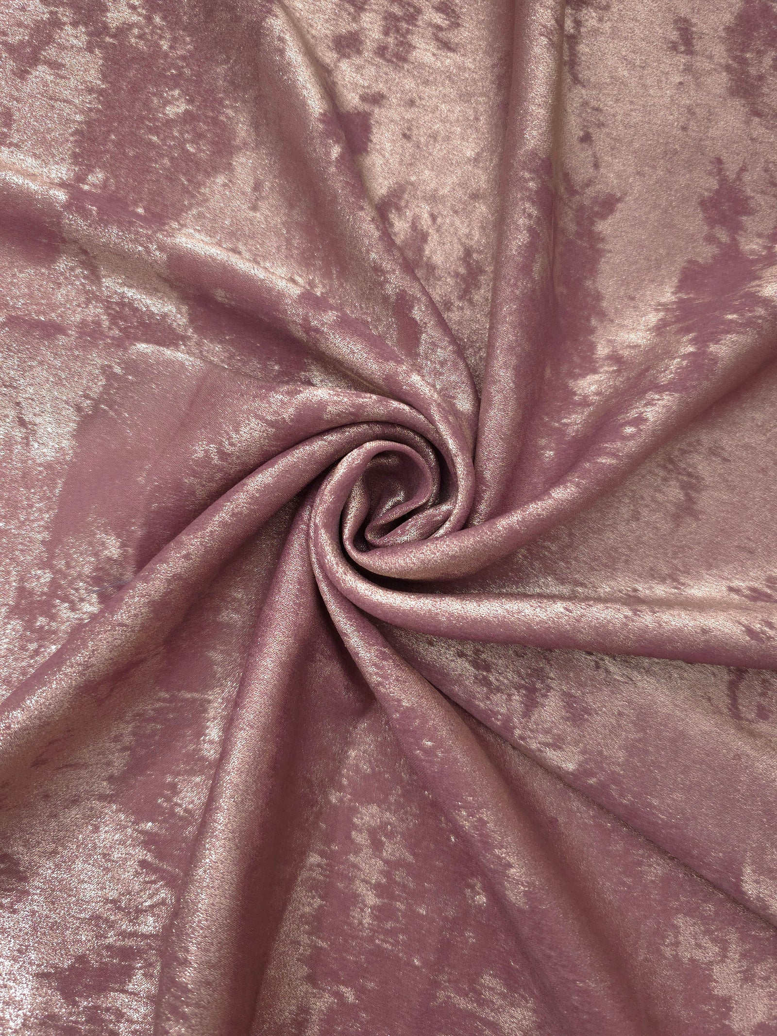 Rosette drape of Rose Mauve Lurex Italiano fabric emphasizing shimmer for kaftans and occasionwear.