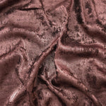 Flowing folds of Rosewood Lurex Italiano fabric highlighting drape for abayas, kaftans and dresses.