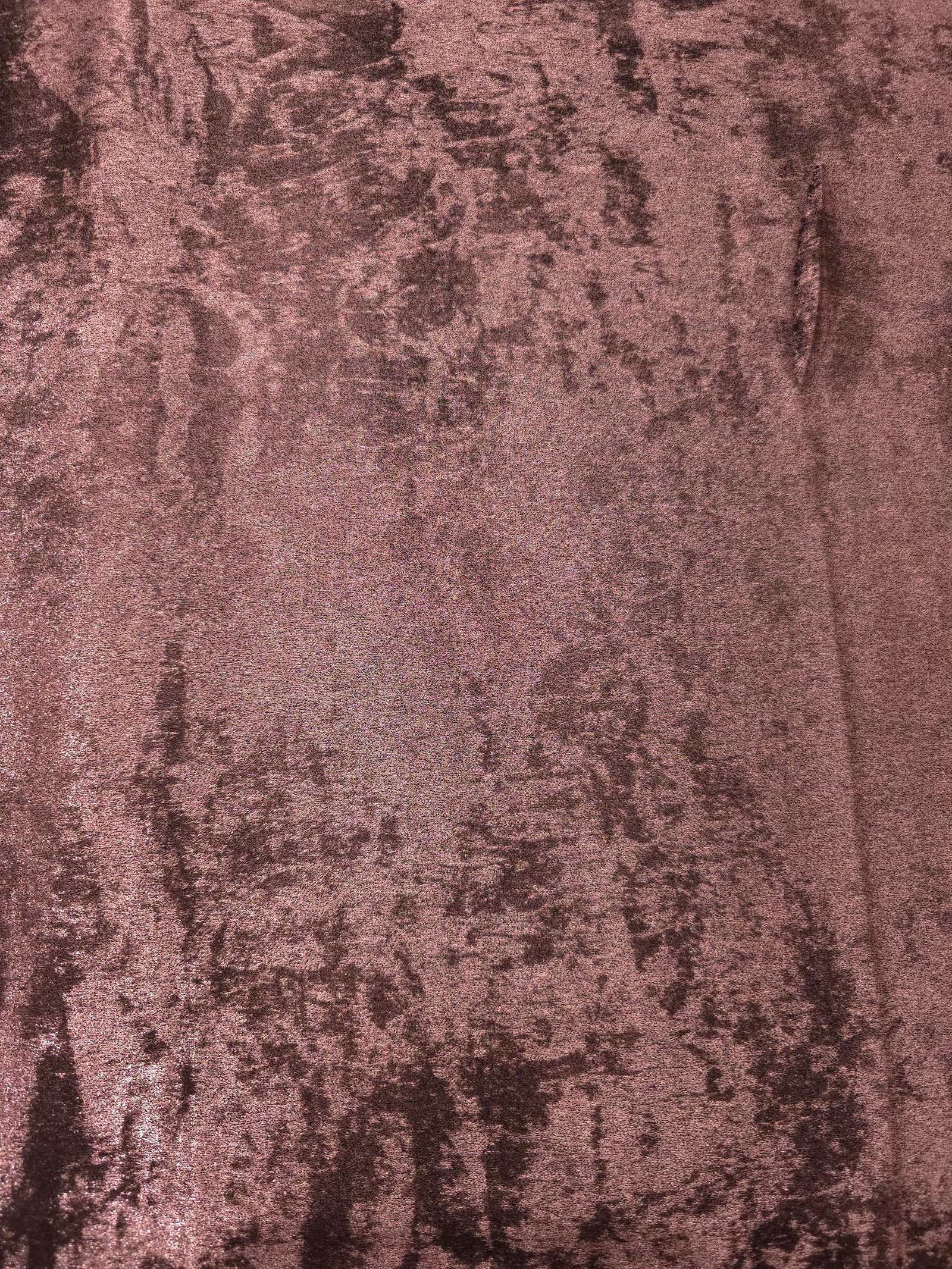 Macro close-up of Rosewood Lurex Italiano fabric revealing metallic texture for designer apparel.