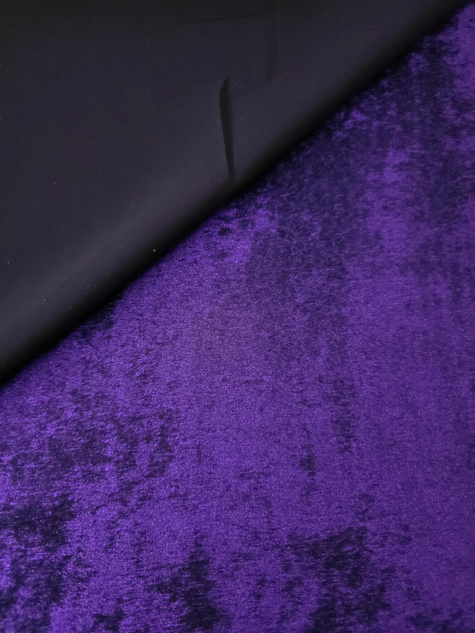 Flowing folds of Royal Purple Lurex Italiano fabric highlighting drape for abayas, kaftans and dresses.