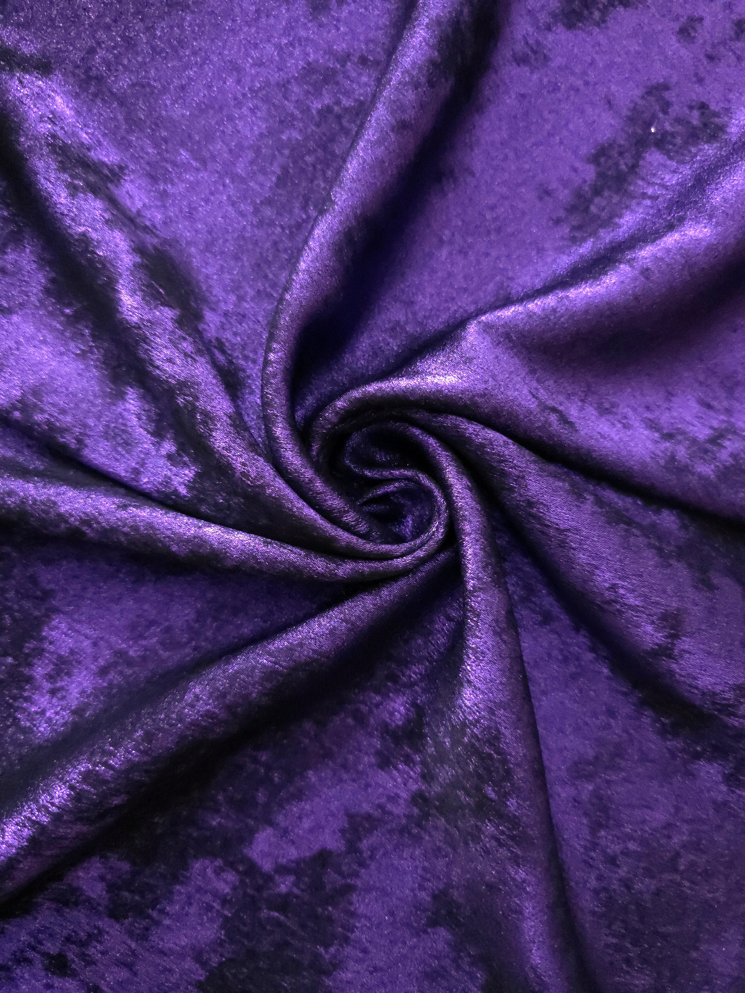 Rosette drape of Royal Purple Lurex Italiano fabric emphasizing shimmer for kaftans and occasionwear.