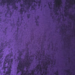 Macro close-up of Royal Purple Lurex Italiano fabric revealing metallic texture for designer apparel.