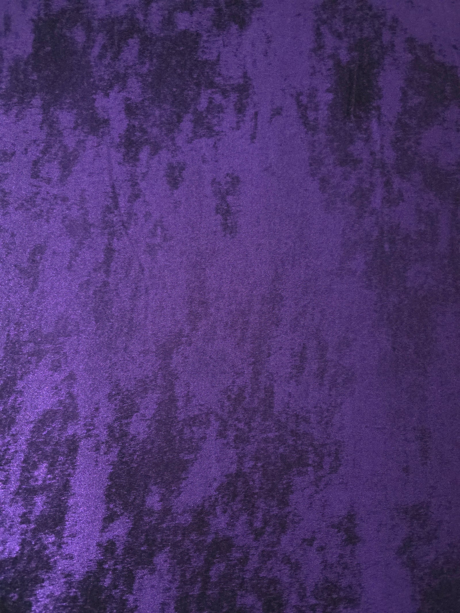 Macro close-up of Royal Purple Lurex Italiano fabric revealing metallic texture for designer apparel.