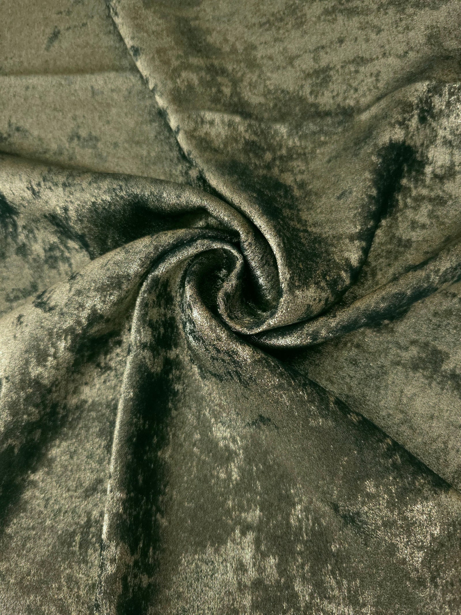 Rosette drape of Sage Olive Lurex Italiano fabric emphasizing shimmer for kaftans and occasionwear.