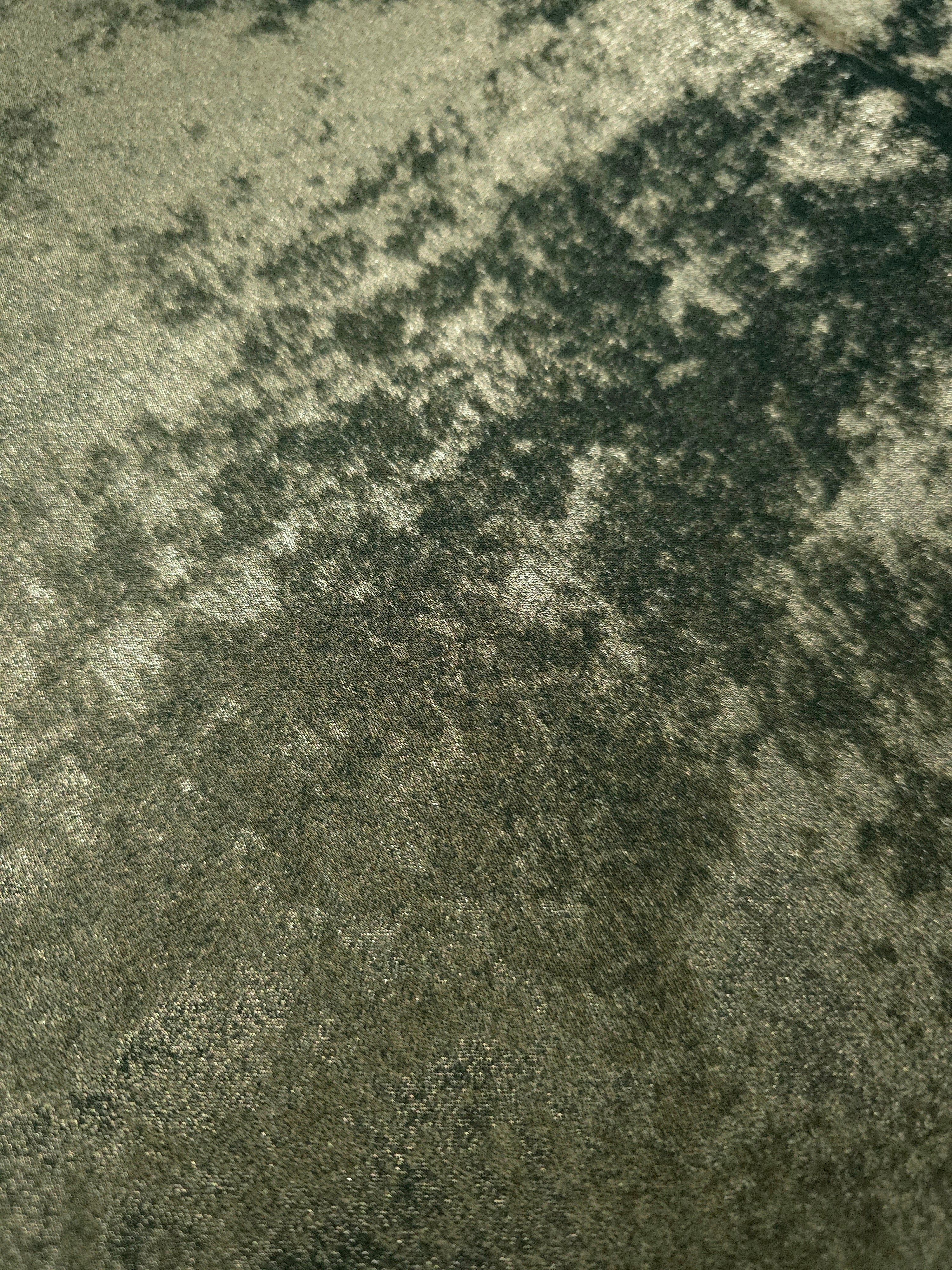 Macro close-up of Sage Olive Lurex Italiano fabric revealing metallic texture for designer apparel.