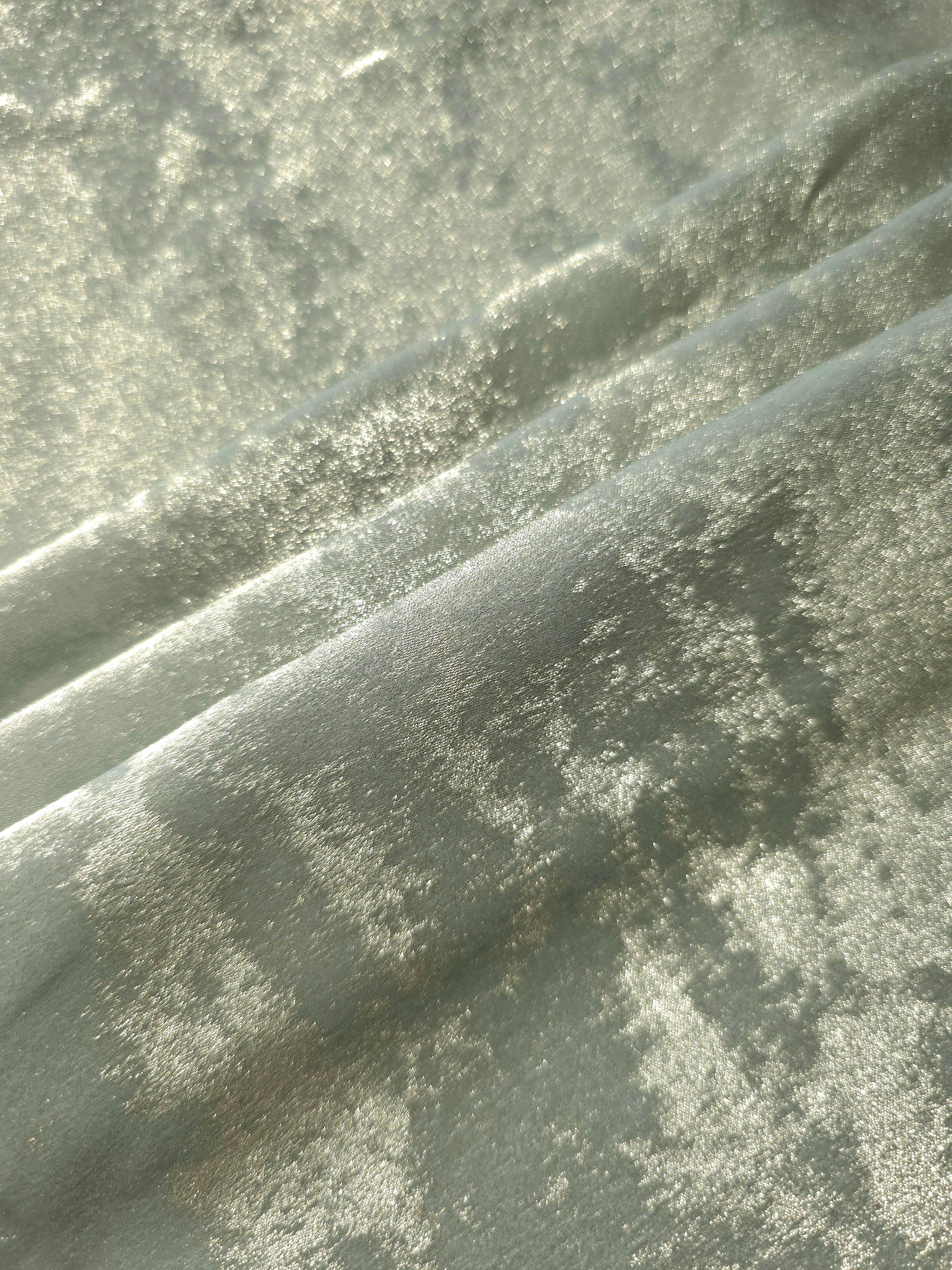 Sage Silver Lurex Italiano metallic fabric arranged in diagonal eveningwear folds