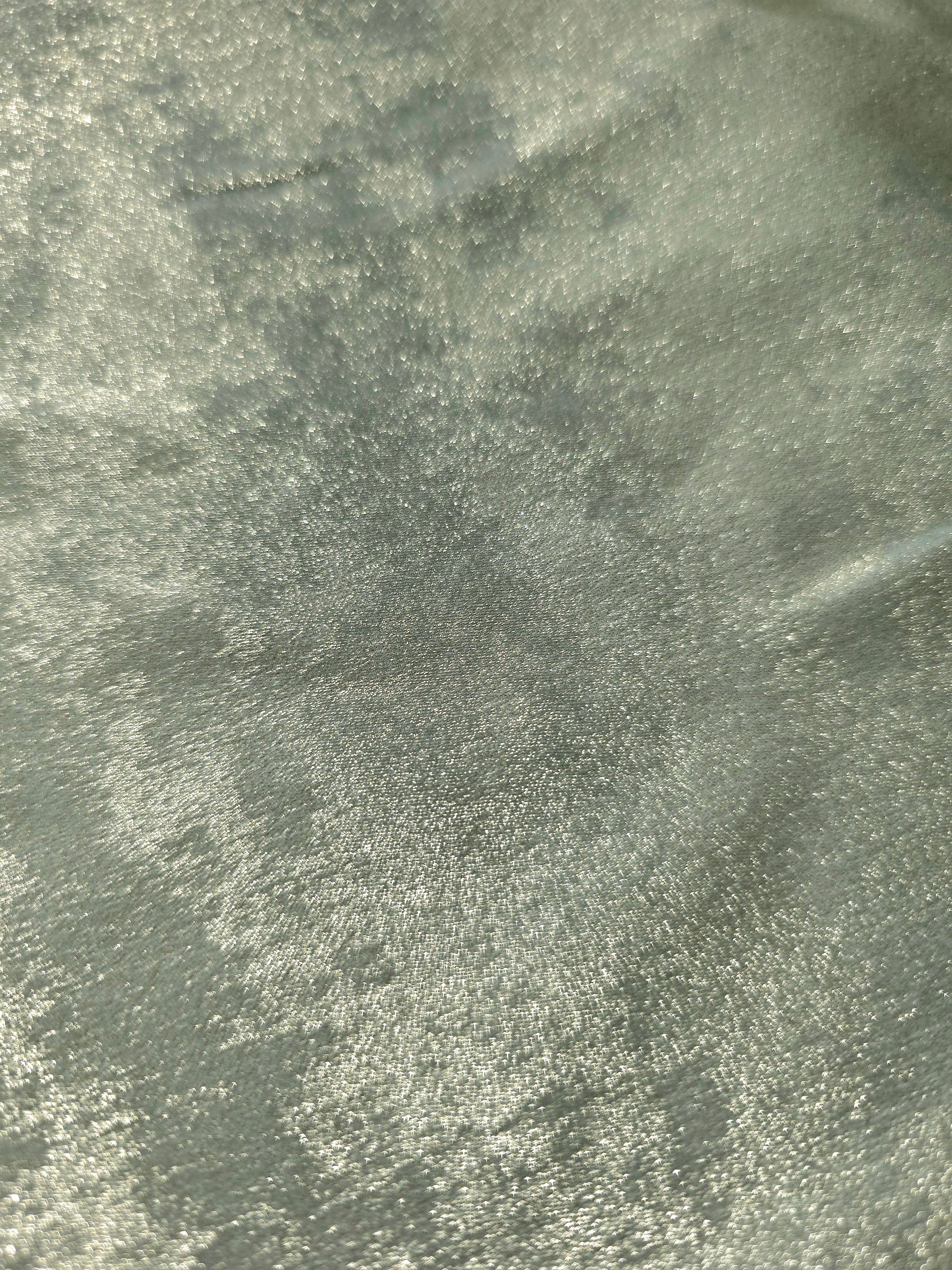 Macro detail of Sage Silver Lurex Italiano metallic fabric with pearlescent texture