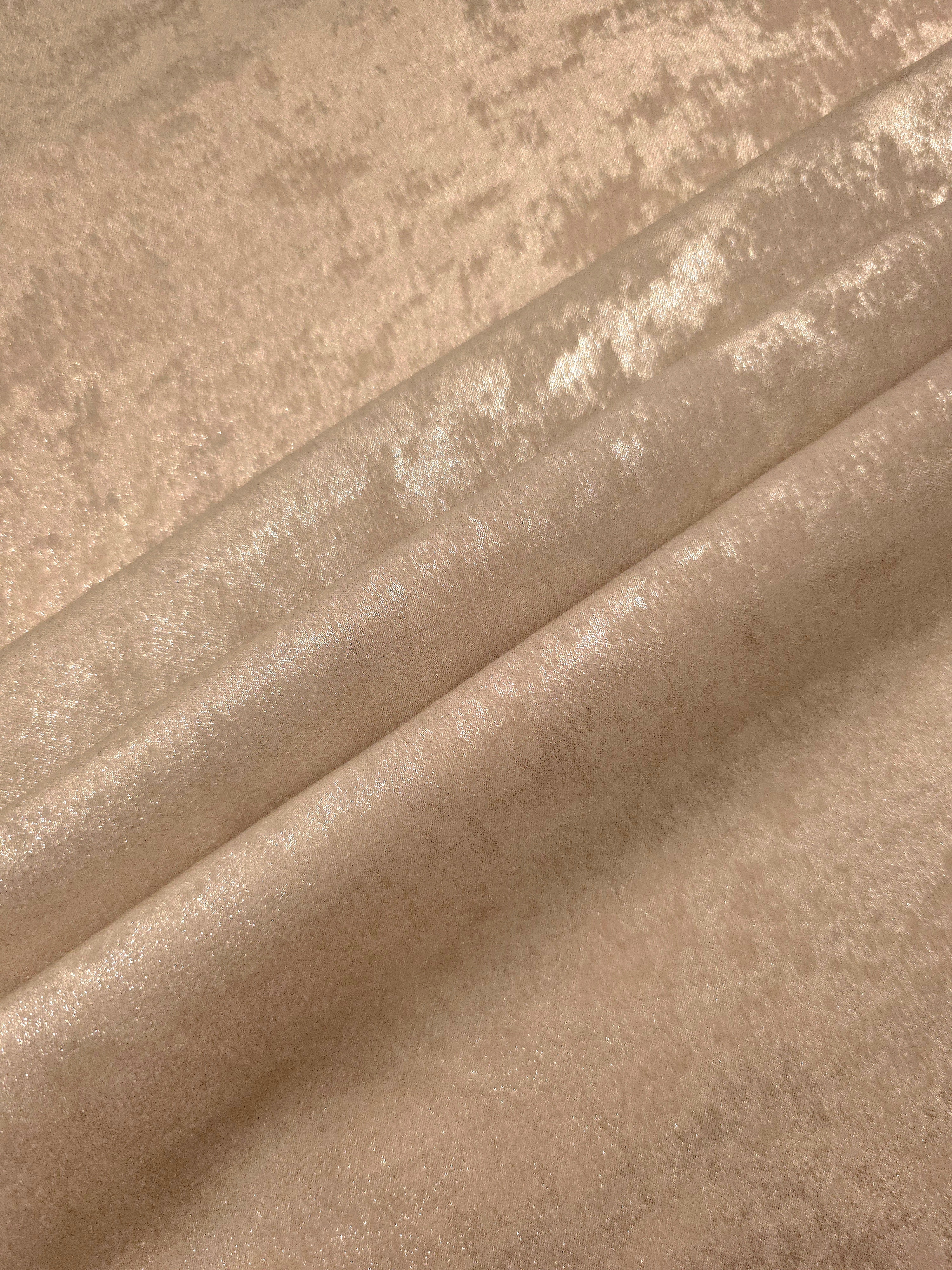 Sand Gold Lurex Italiano metallic fabric arranged in diagonal folds for eveningwear