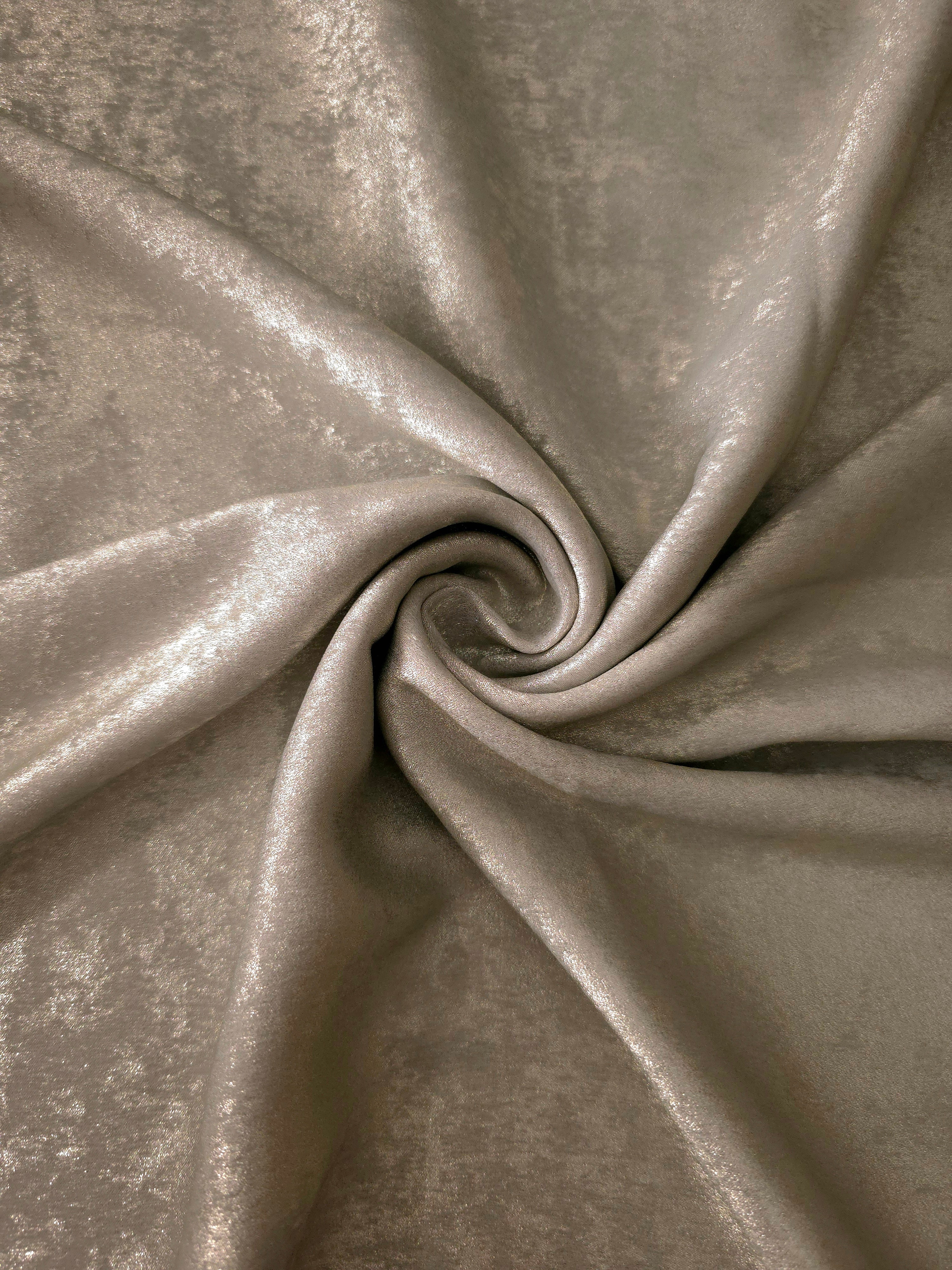 Silver Greige Lurex Italiano metallic fabric in a rosette drape with subtle shimmer