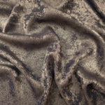 Flowing folds of Smoky Taupe Lurex Italiano fabric highlighting drape for abayas, kaftans and dresses.