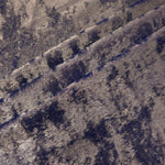 Smoky Violet Lurex Italiano fabric in diagonal folds showing metallic sheen and drape for eveningwear.