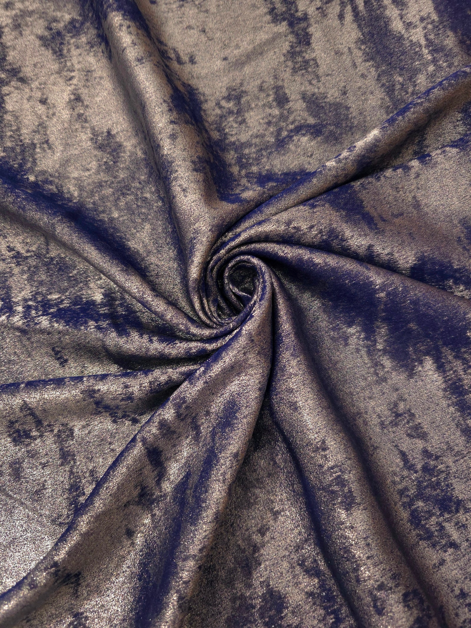 Flowing folds of Smoky Violet Lurex Italiano fabric highlighting drape for abayas, kaftans and dresses.