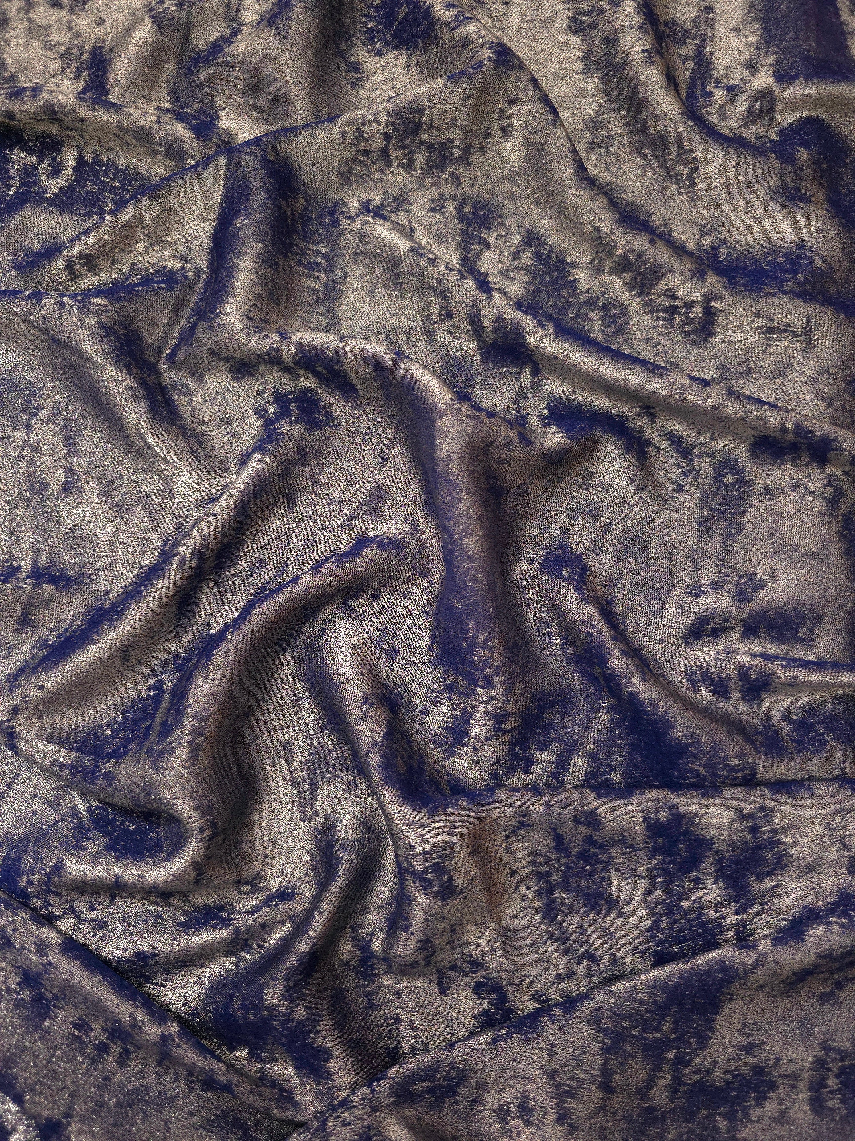 Rosette drape of Smoky Violet Lurex Italiano fabric emphasizing shimmer for kaftans and occasionwear.