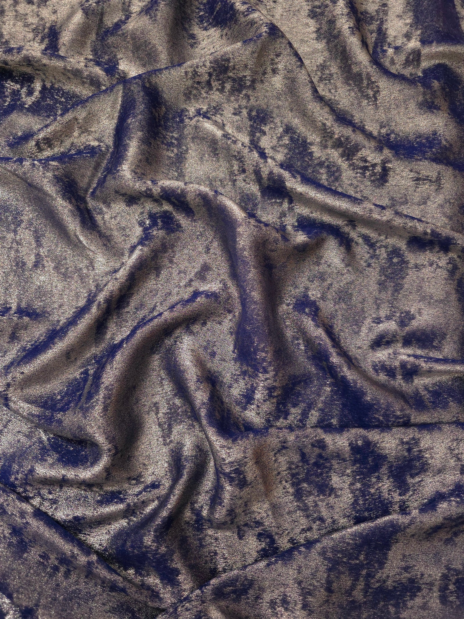 Rosette drape of Smoky Violet Lurex Italiano fabric emphasizing shimmer for kaftans and occasionwear.