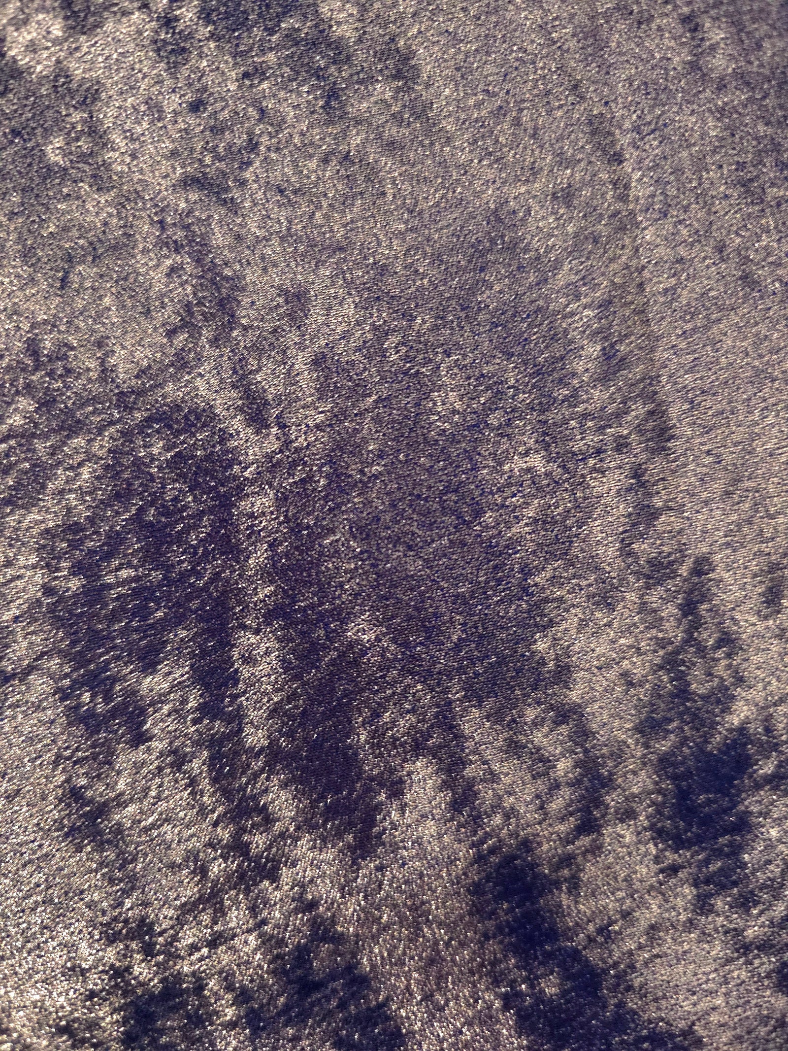 Macro close-up of Smoky Violet Lurex Italiano fabric revealing metallic texture for designer apparel.