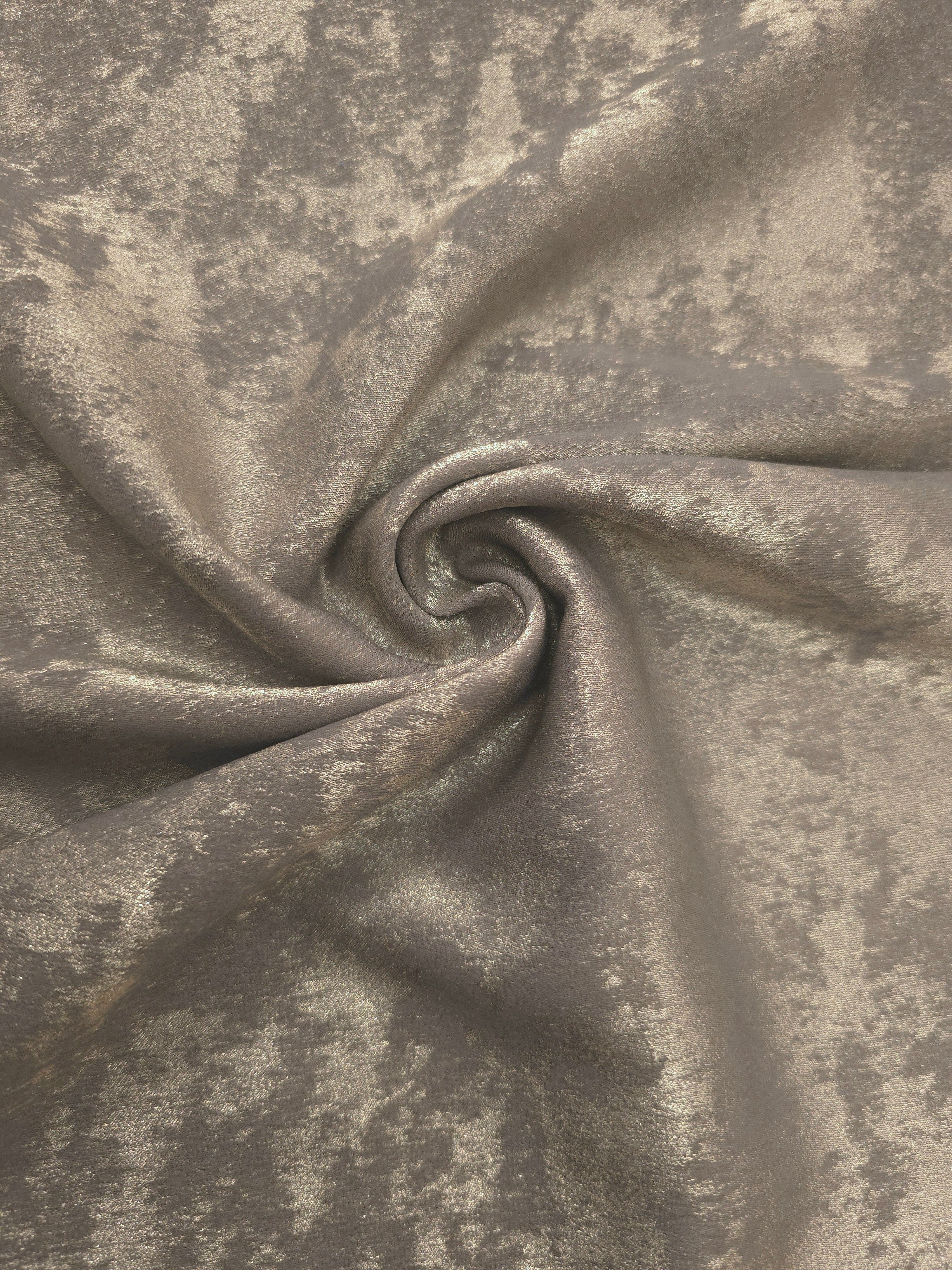 Rosette drape of Stone Greige Lurex Italiano fabric emphasizing shimmer for kaftans and occasionwear.