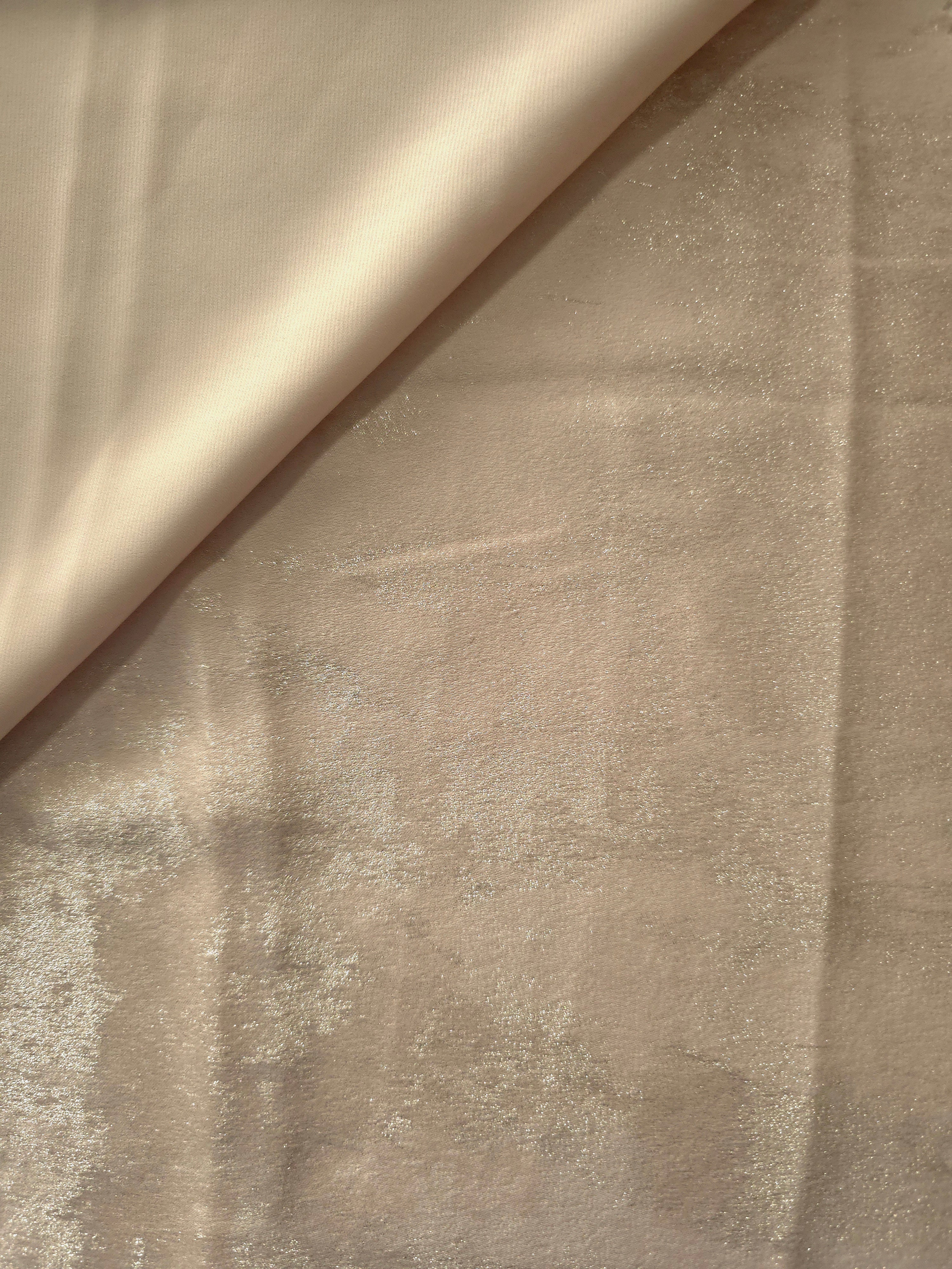 Fluid drape of Vanilla Champagne Lurex Italiano metallic fabric for abayas and dresses