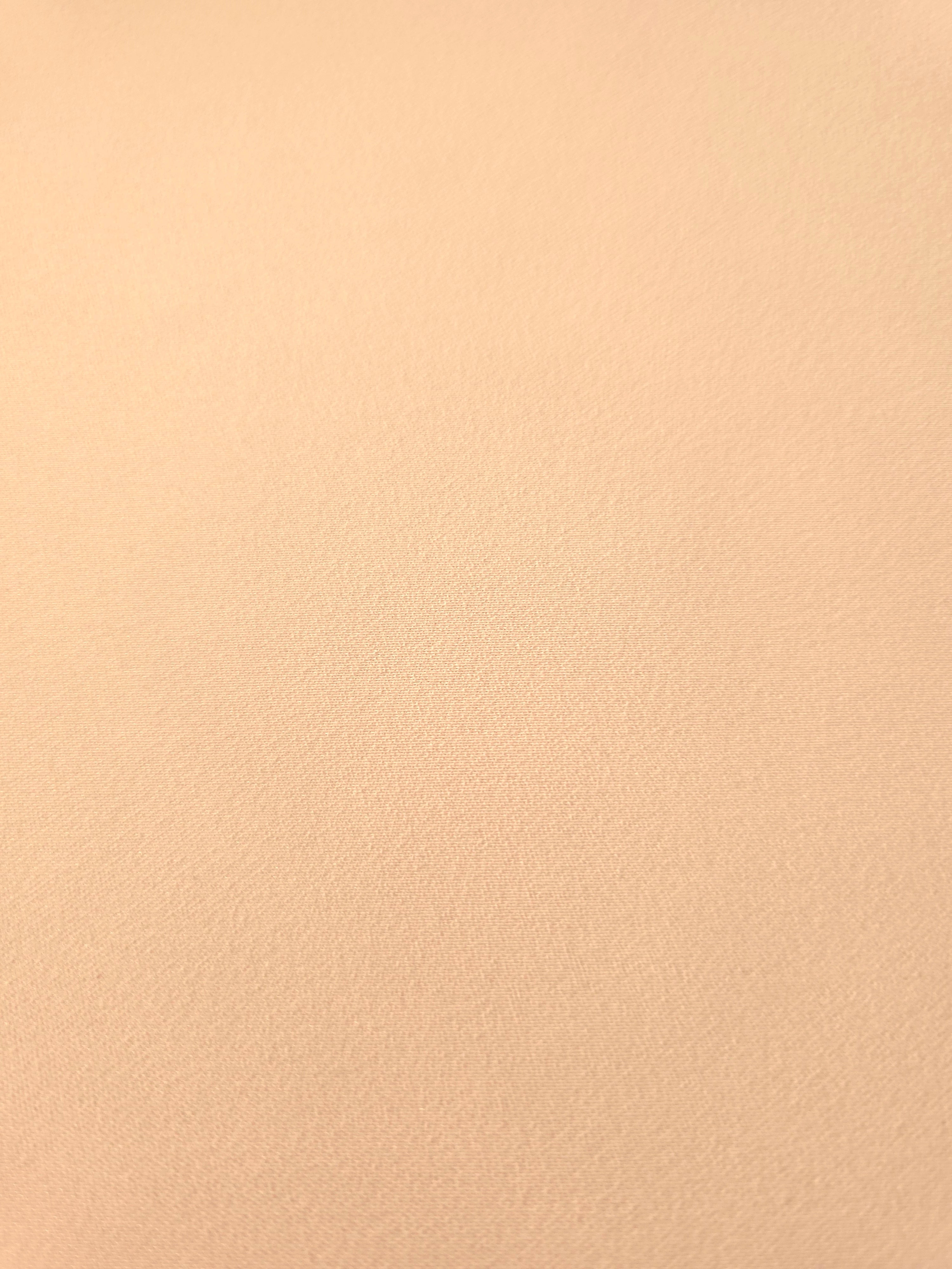 Apricot Nude Silky Italian Crepe with a smooth opaque finish, suitable for formal gowns, abayas and special-occasion skirts.