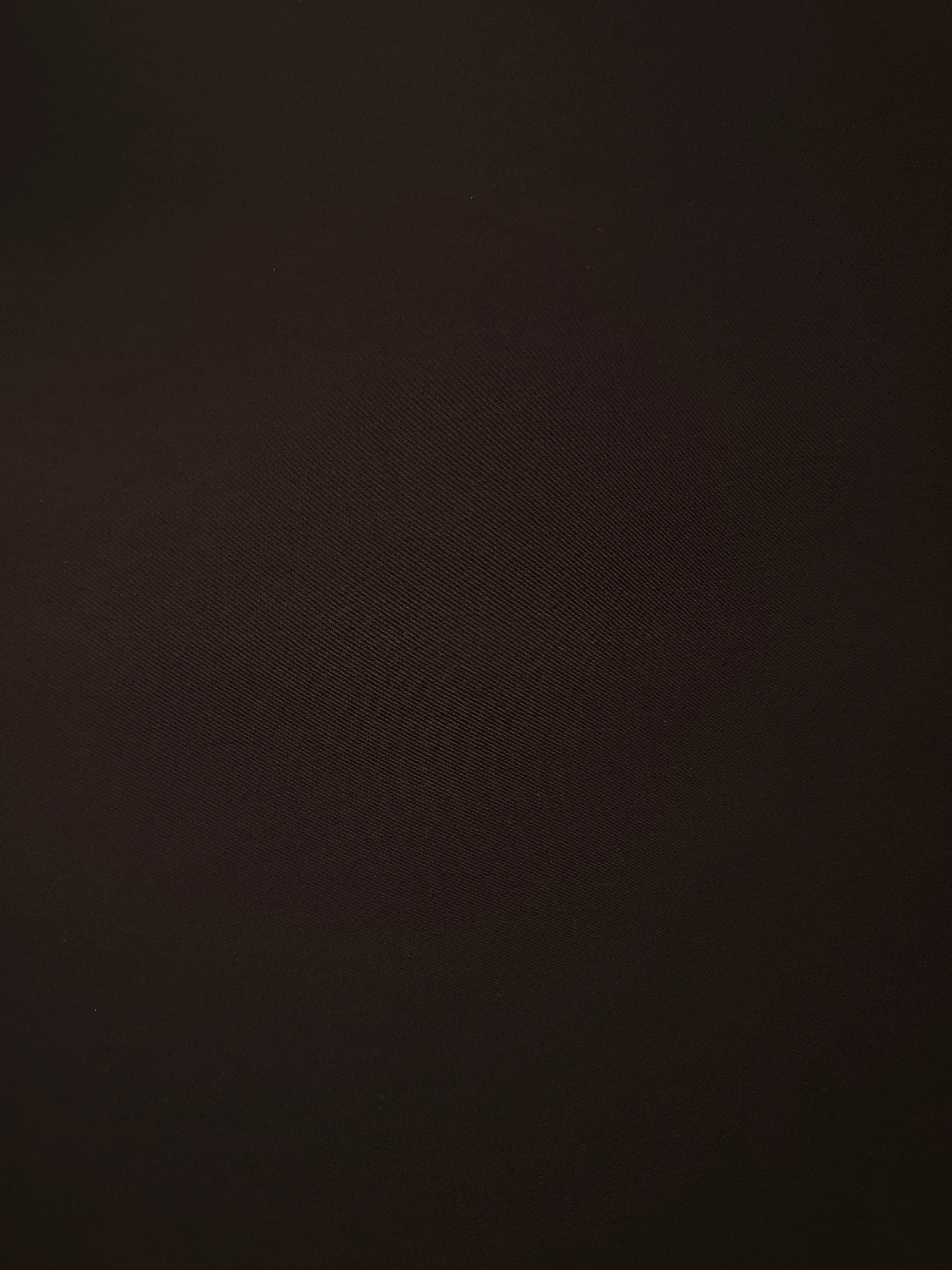 Black Cocoa Silky Italian Crepe with a smooth opaque finish, suitable for cocktail dresses, skirts and polished separates.
