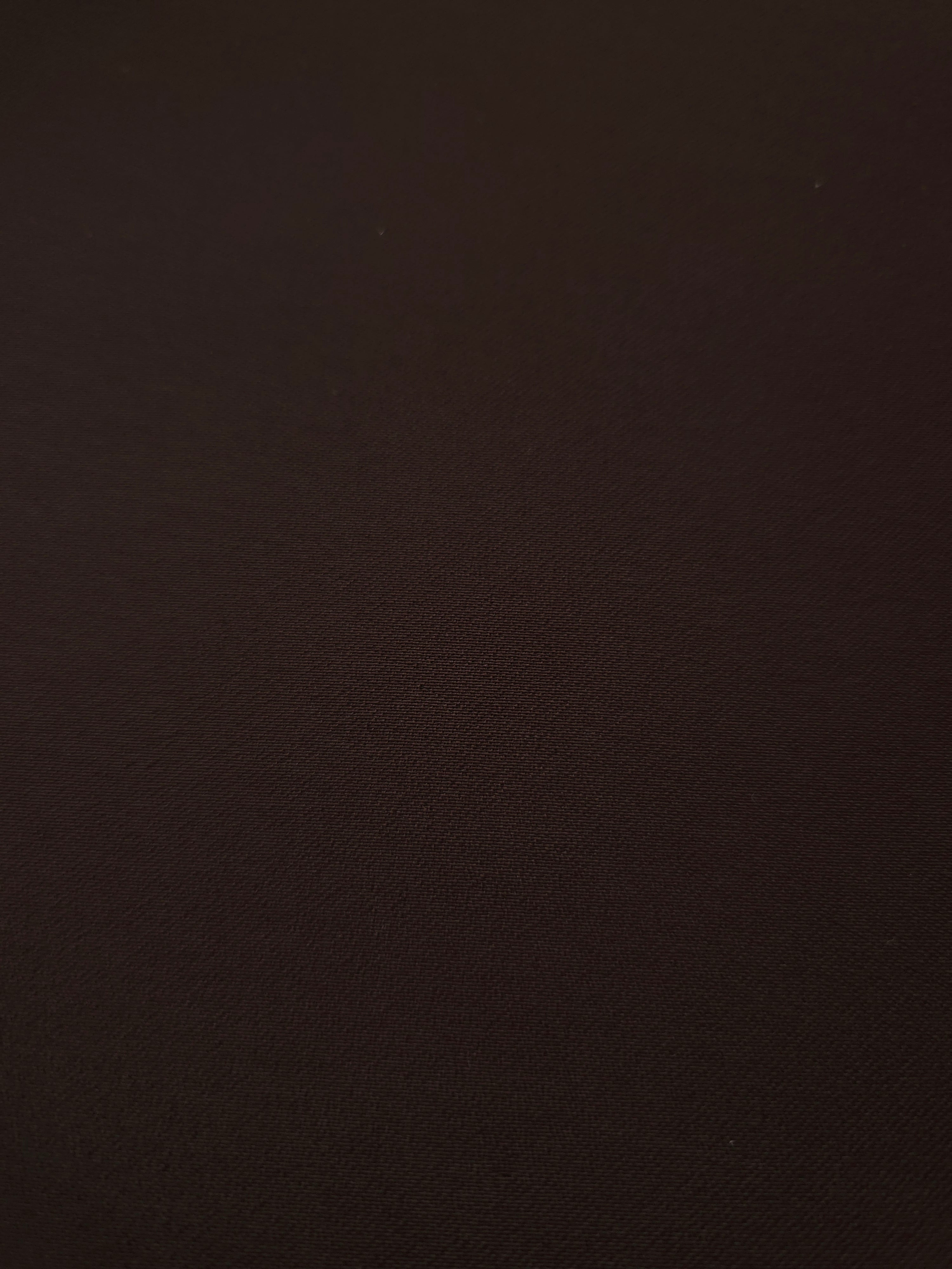 Close-up Black Cocoa Silky Italian Crepe showing its fine woven texture and soft hand, ideal for occasion gowns, tunics and lightweight tailored pieces.