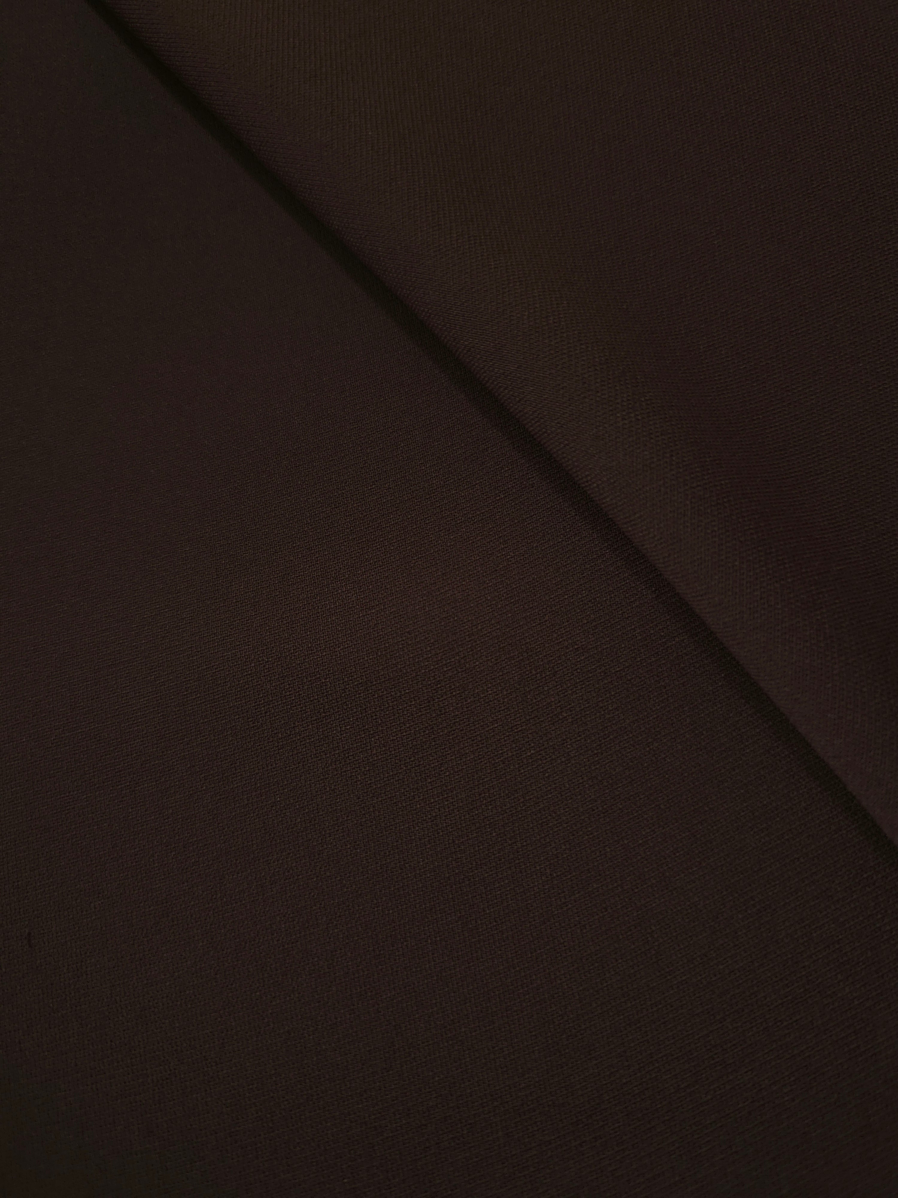 Soft-fold Black Cocoa Silky Italian Crepe showing fluid drape through soft folds, suited to blouses, midi skirts and modest dresses.