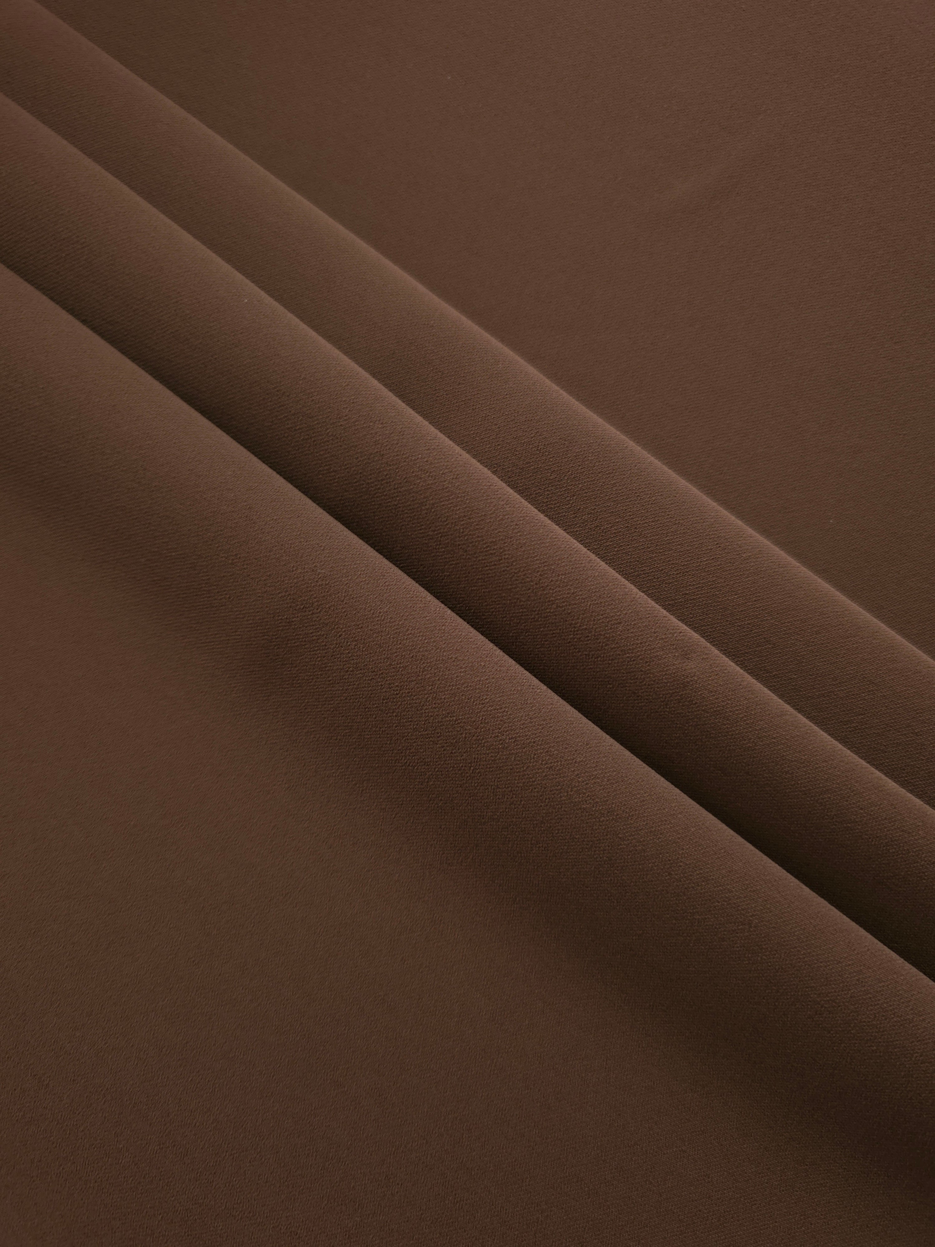 Layered Cocoa Taupe Silky Italian Crepe showing soft structure in layered folds, suitable for draped dresses, elegant tops and modest fashion.