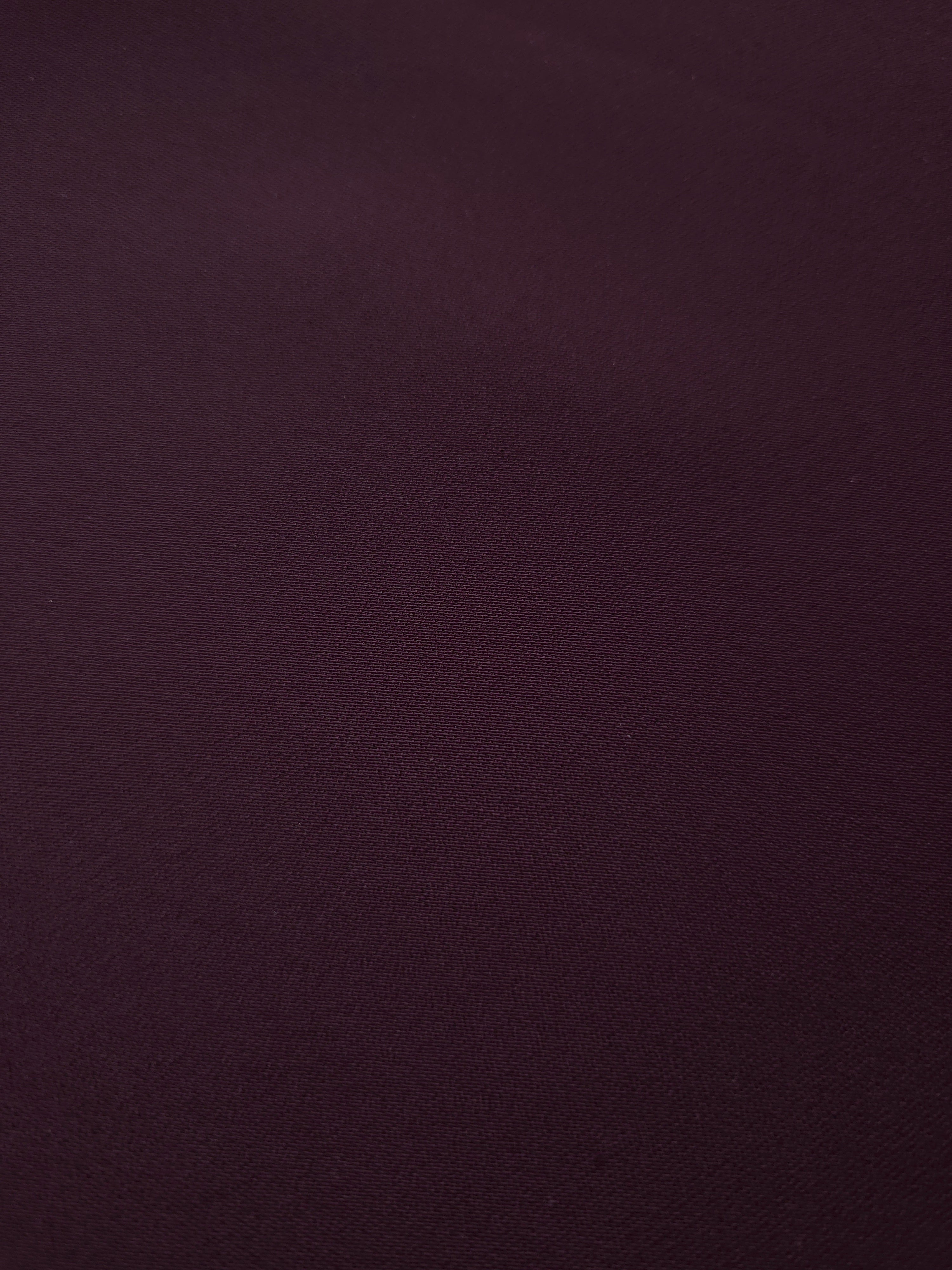 Close-up Damson Plum Silky Italian Crepe showing its fine woven texture and soft hand, ideal for abayas, tunics and elegant shirt dresses.