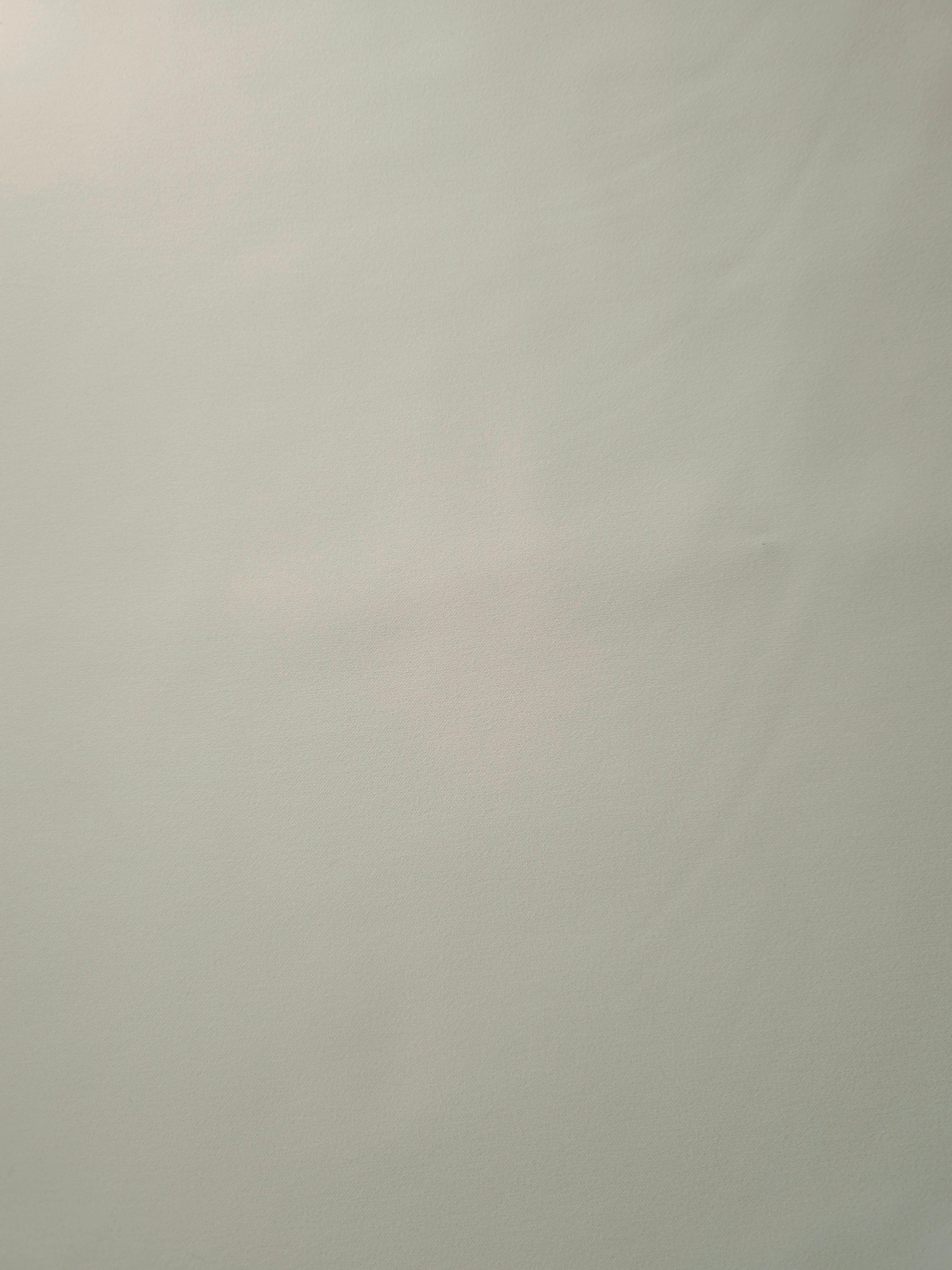 Frosted Ivory Silky Italian Crepe with a smooth opaque finish, suitable for cocktail dresses, skirts and polished separates.