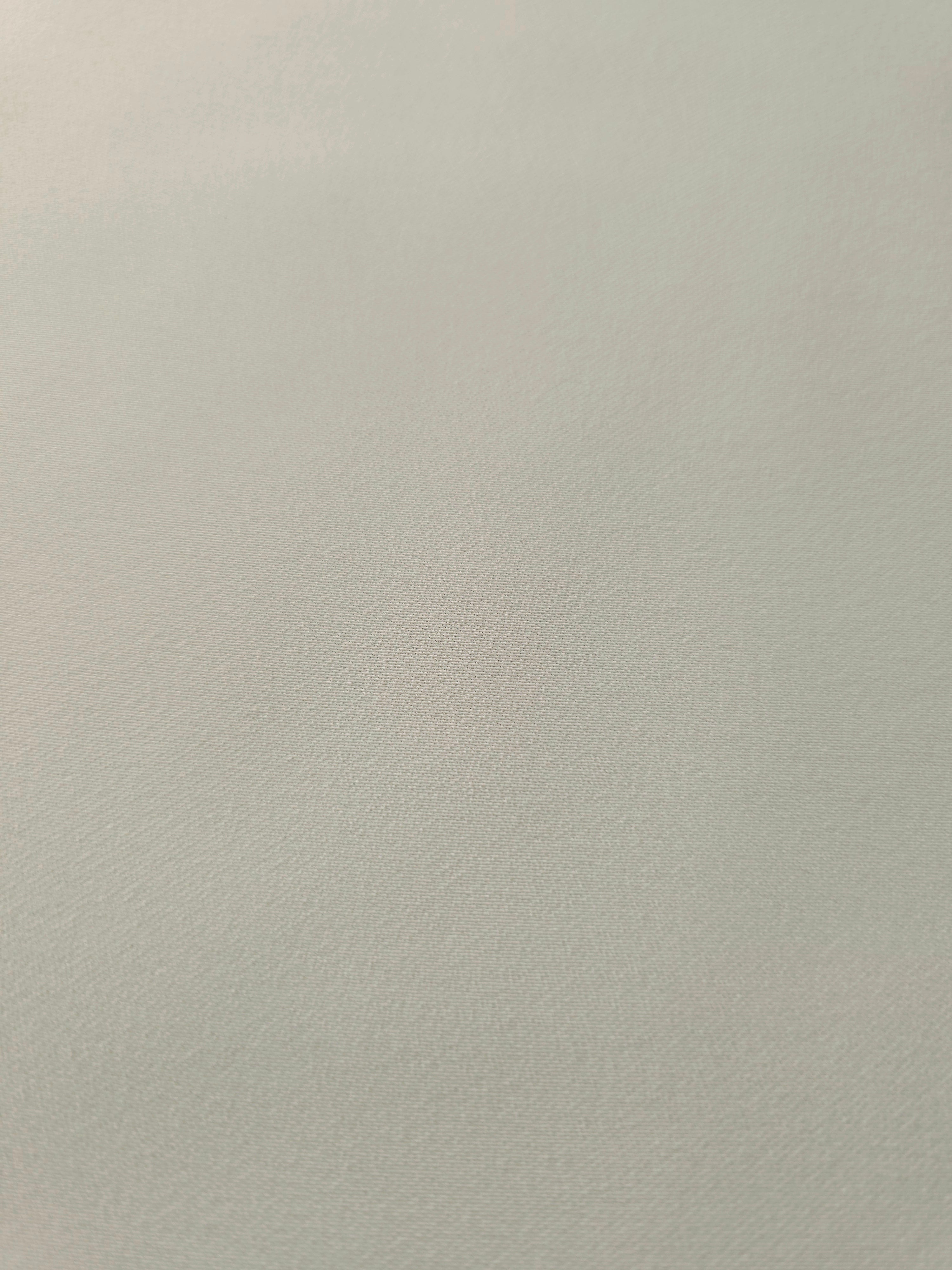 Close-up Frosted Ivory Silky Italian Crepe showing its fine woven texture and soft hand, ideal for occasion gowns, tunics and lightweight tailored pieces.