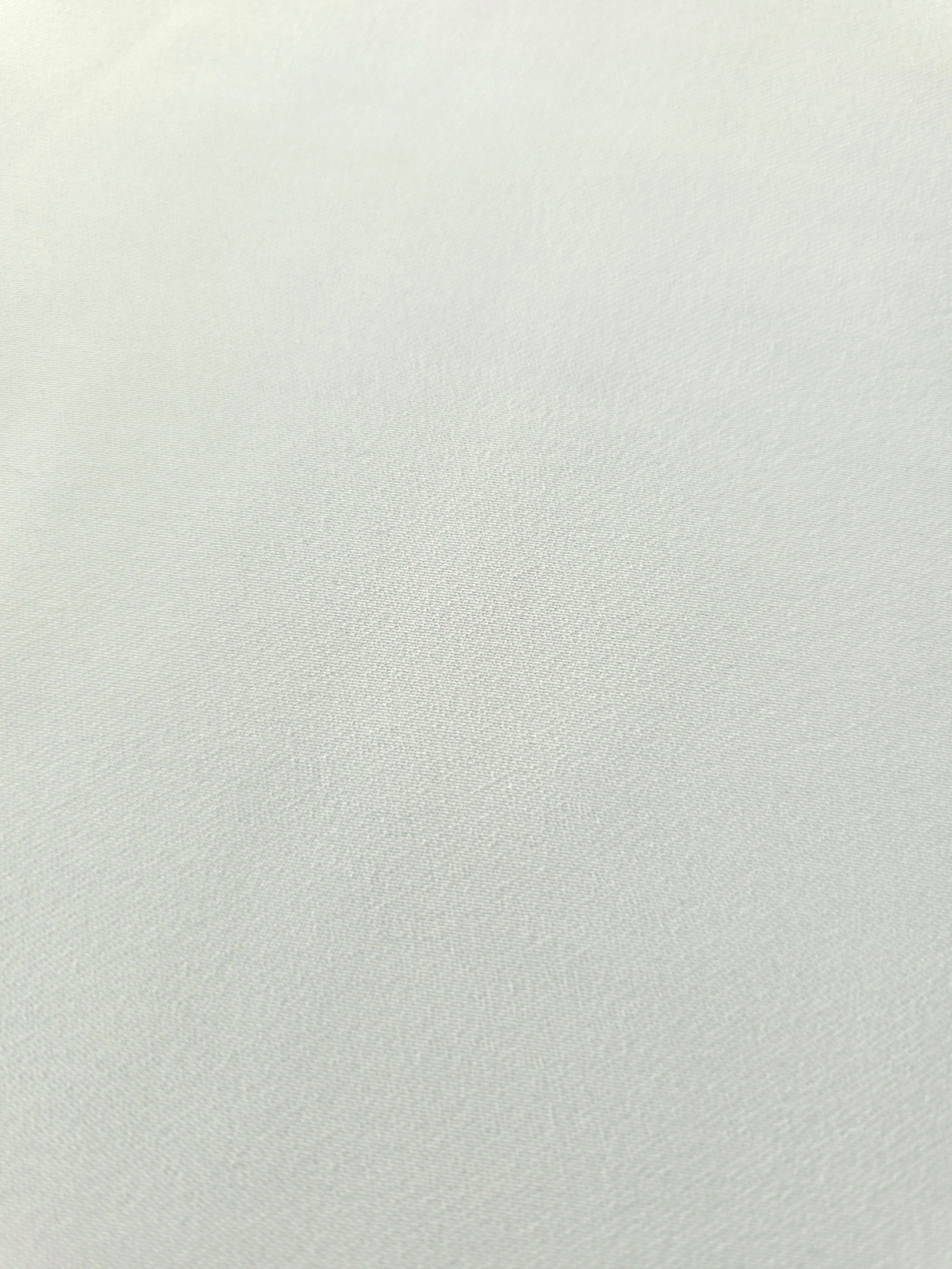 Close-up Glacial Mint Silky Italian Crepe showing its fine woven texture and soft hand, ideal for abayas, tunics and elegant shirt dresses.