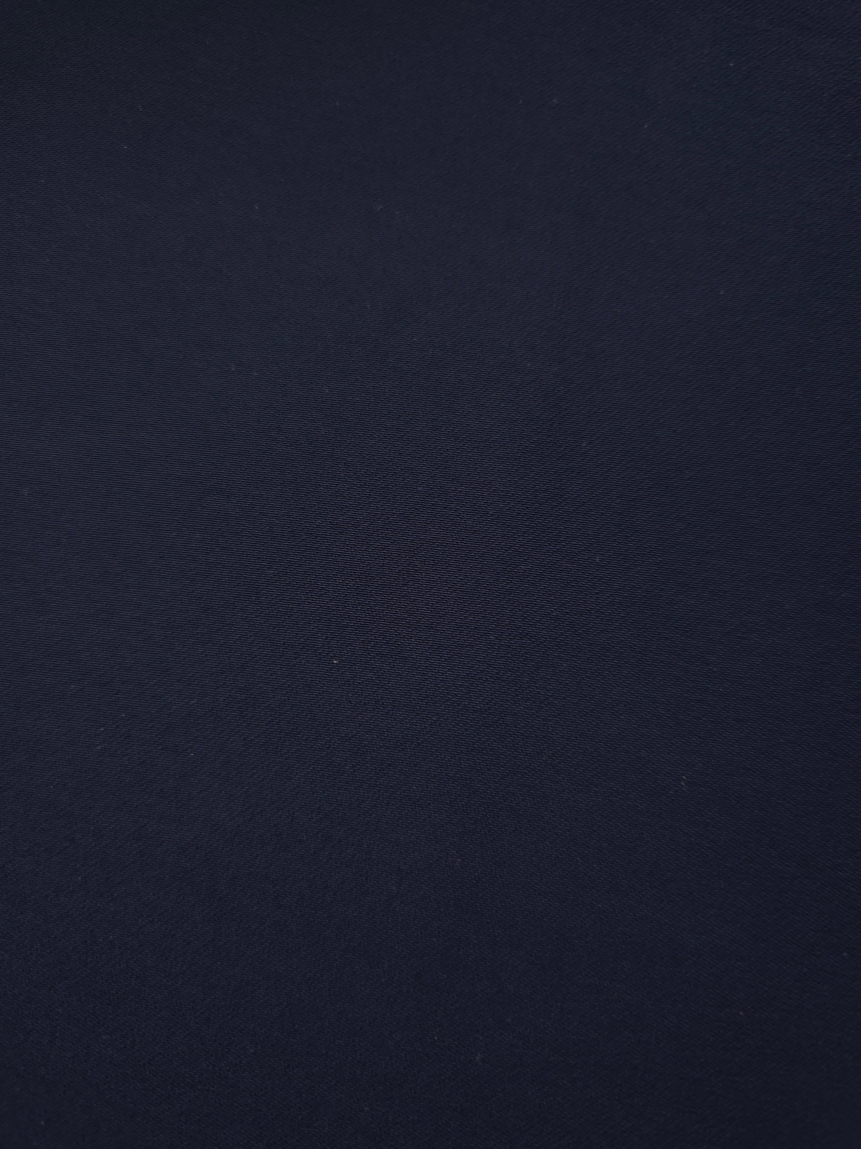 Close-up Midnight Marine Silky Italian Crepe showing its fine woven texture and soft hand, ideal for wrap dresses, wide-leg trousers and dressy co-ords.