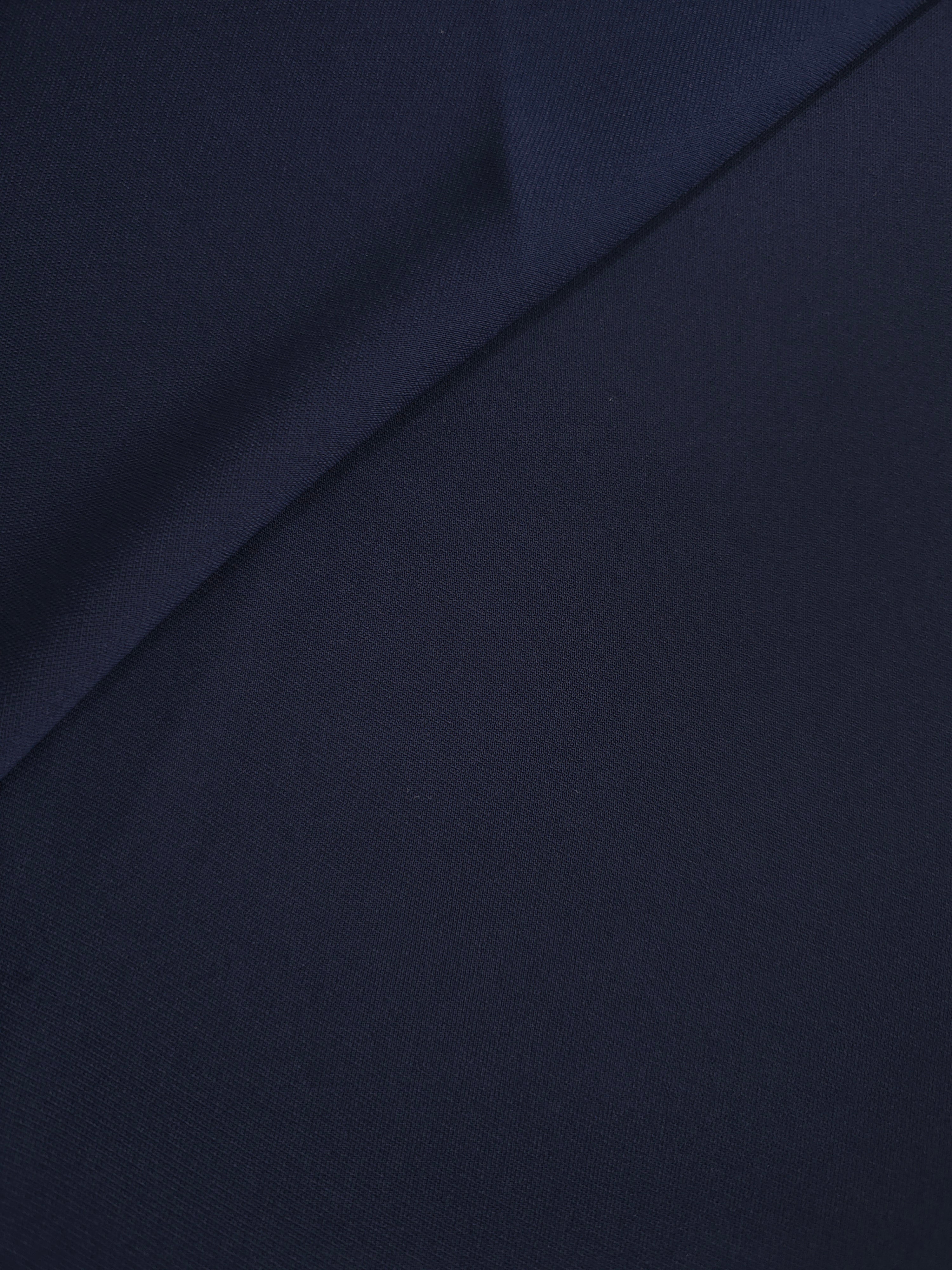 Soft-fold Midnight Marine Silky Italian Crepe showing fluid drape through soft folds, suited to formal gowns, abayas and special-occasion skirts.