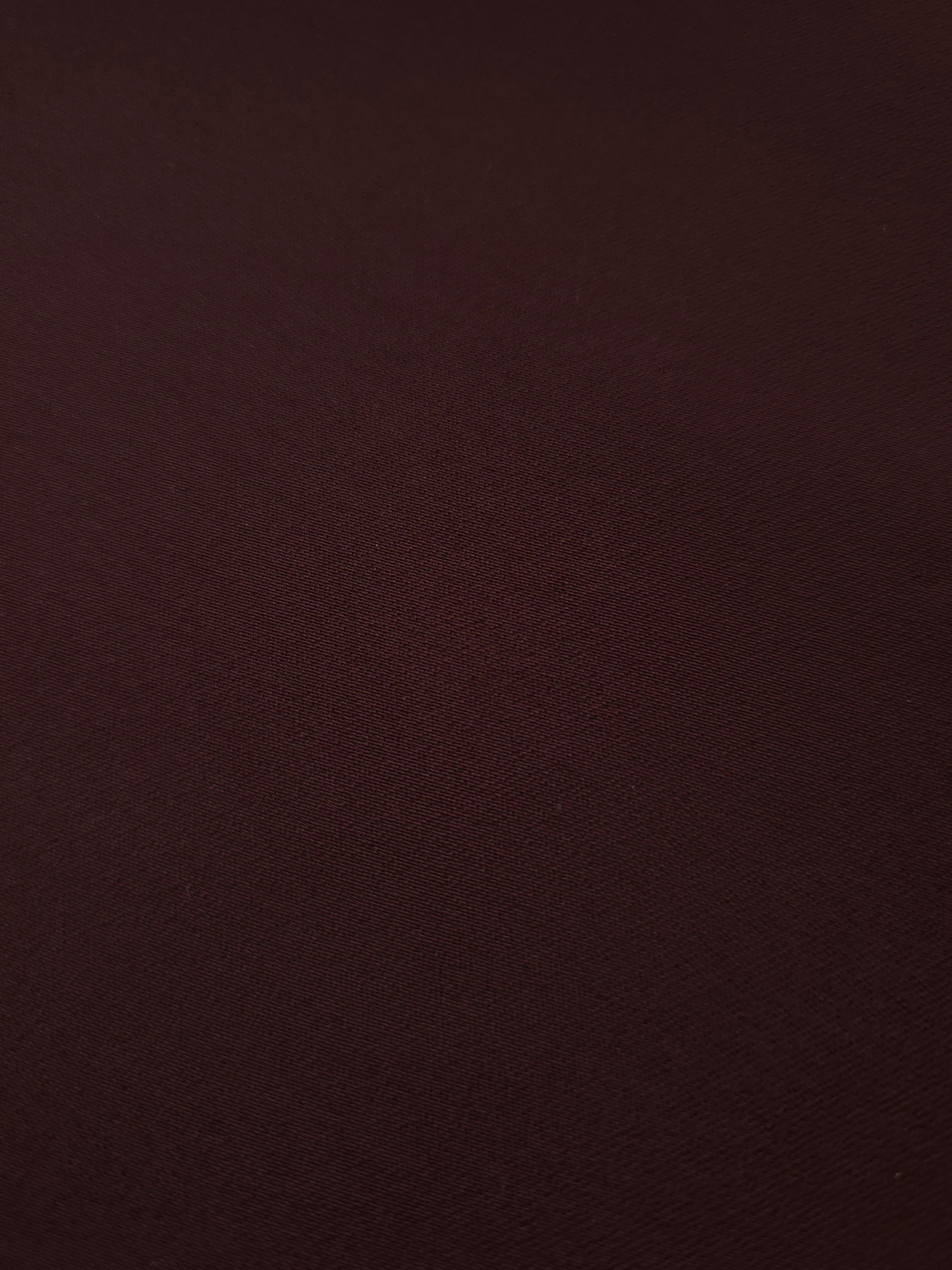 Close-up Mulberry Merlot Silky Italian Crepe showing its fine woven texture and soft hand, ideal for draped dresses, elegant tops and modest fashion.